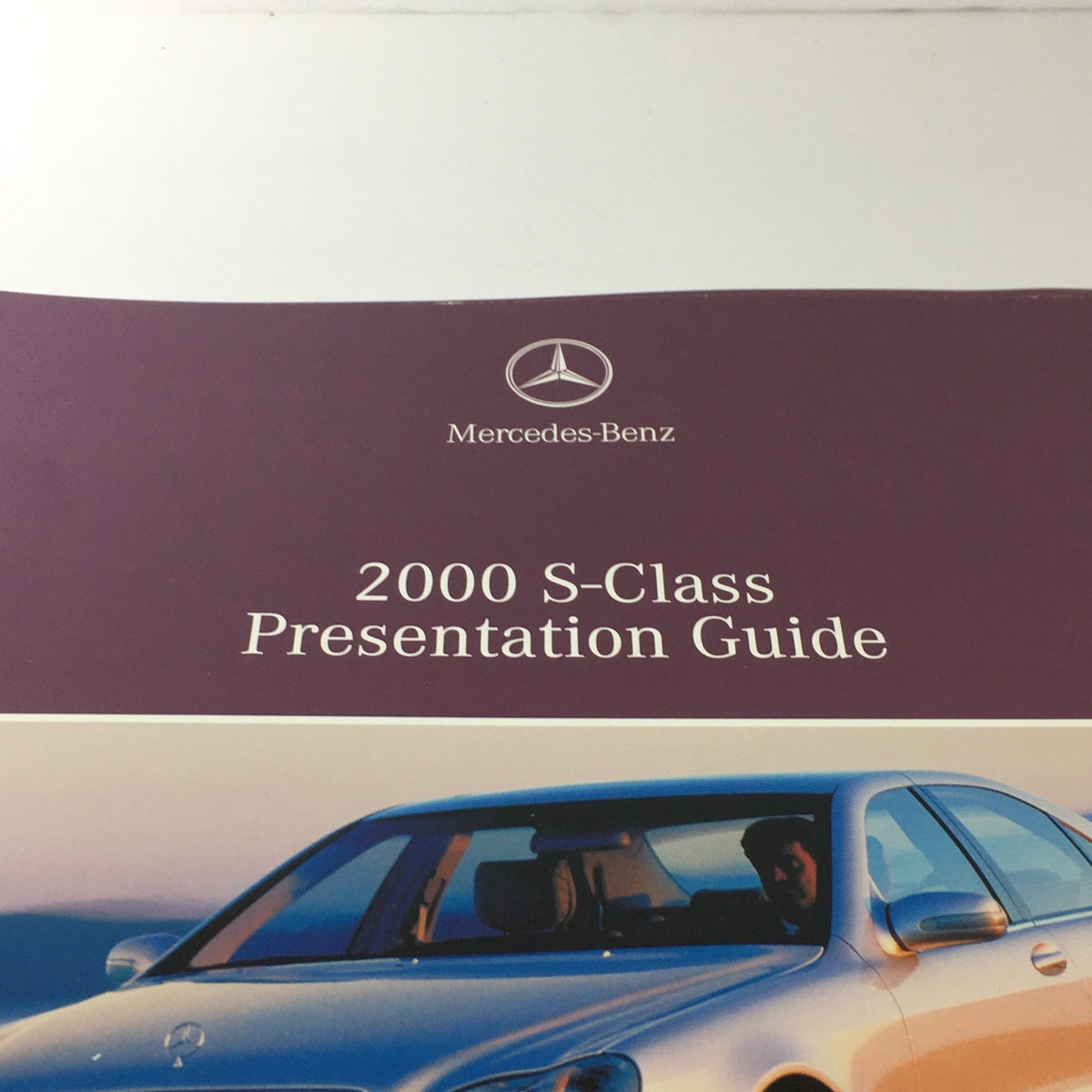Close-up of the 2000 Mercedes-Benz S-Class Presentation Guide title, highlighting the luxury branding and detail.