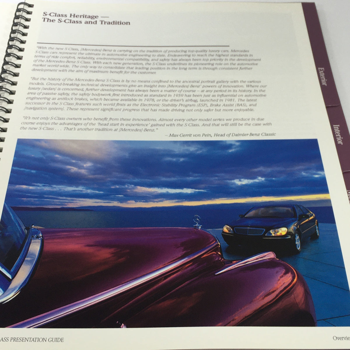 S-Class Heritage page in the 2000 Mercedes-Benz S-Class Presentation Guide, showcasing the luxury vehicle in a scenic setting.