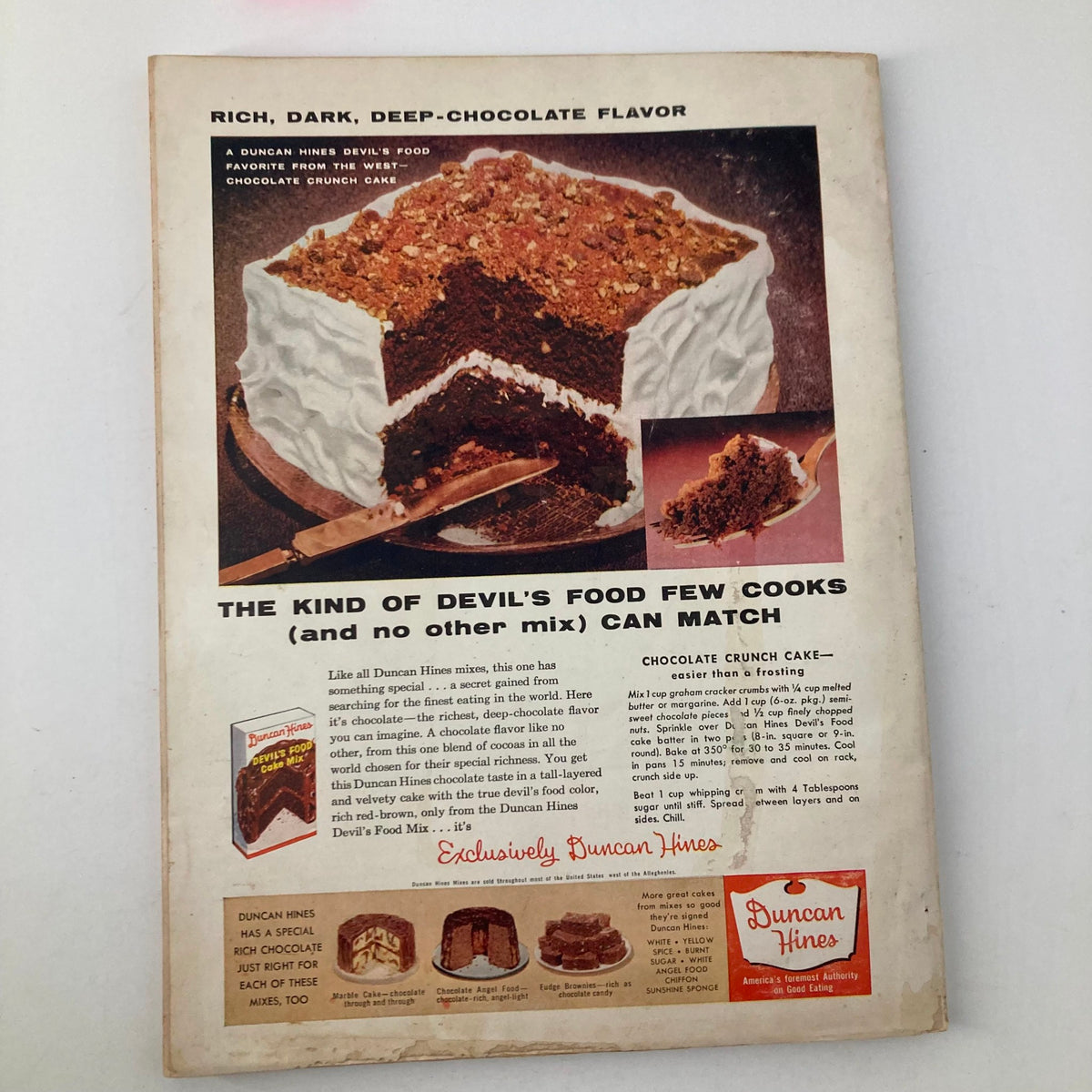Back cover of the VTG Good Housekeeping Magazine March 1957 showcasing a Duncan Hines advertisement for a chocolate crunch cake with recipe details.