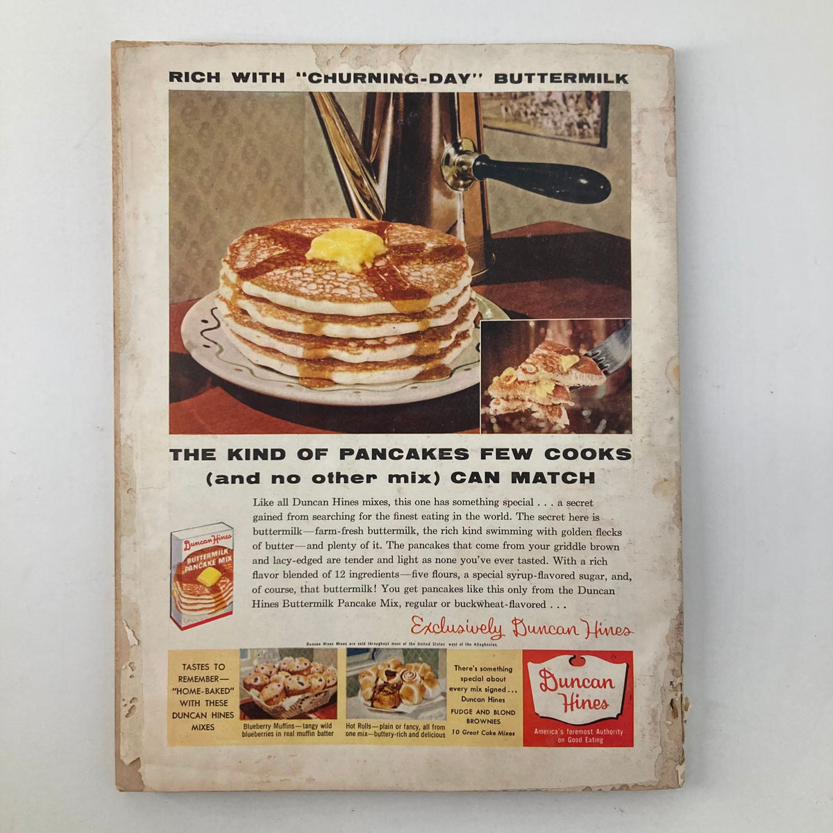 Back cover of Good Housekeeping Magazine April 1957 featuring a delicious stack of pancakes with butter and syrup, promoting Duncan Hines buttermilk pancake mix.