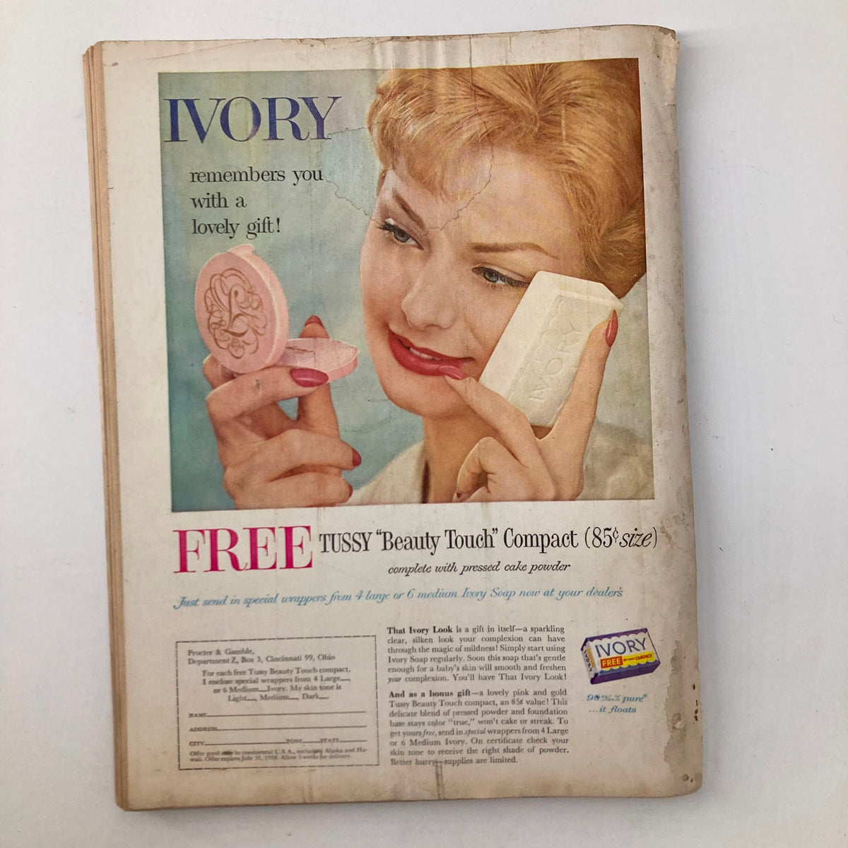 Back cover of the February 1958 Good Housekeeping Magazine featuring an advertisement for Ivory soap and a beauty compact offer.