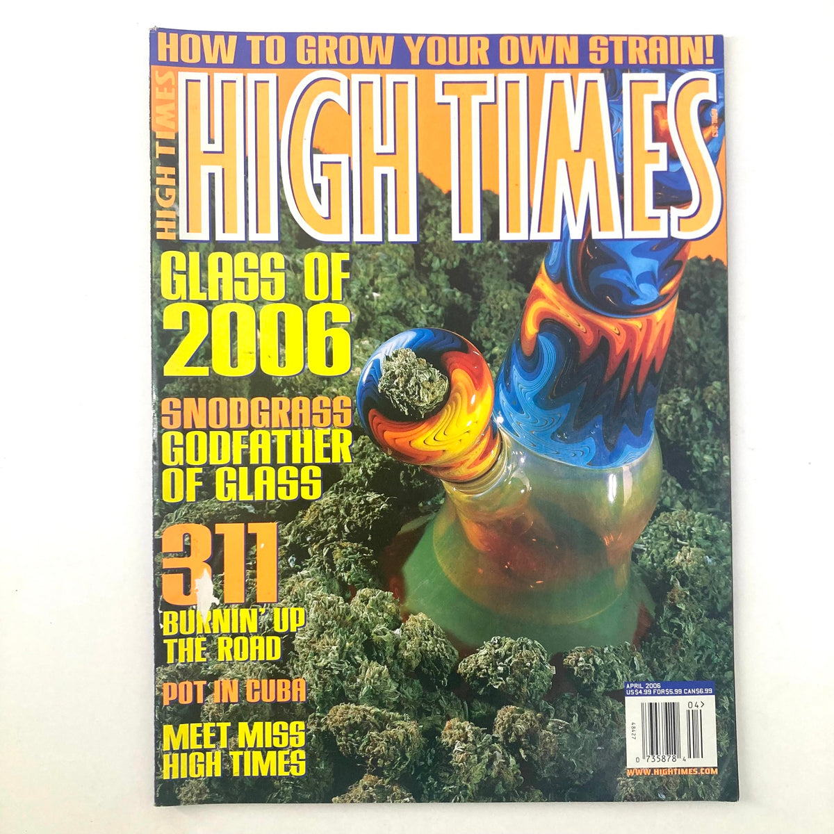 High Times Magazine April 2006 featuring Snodgrass, the Godfather of Glass, showcasing vibrant glass artwork and cannabis culture. A collectible issue highlighting glass artistry.