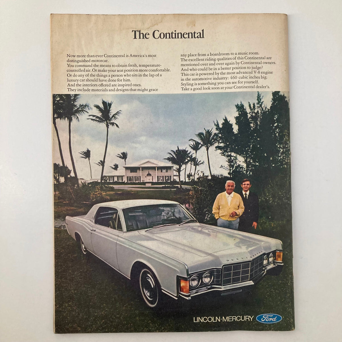 Gourmet Magazine June 1969 advertisement for the Continental, showcasing luxury motoring with a classic car in a tropical setting.