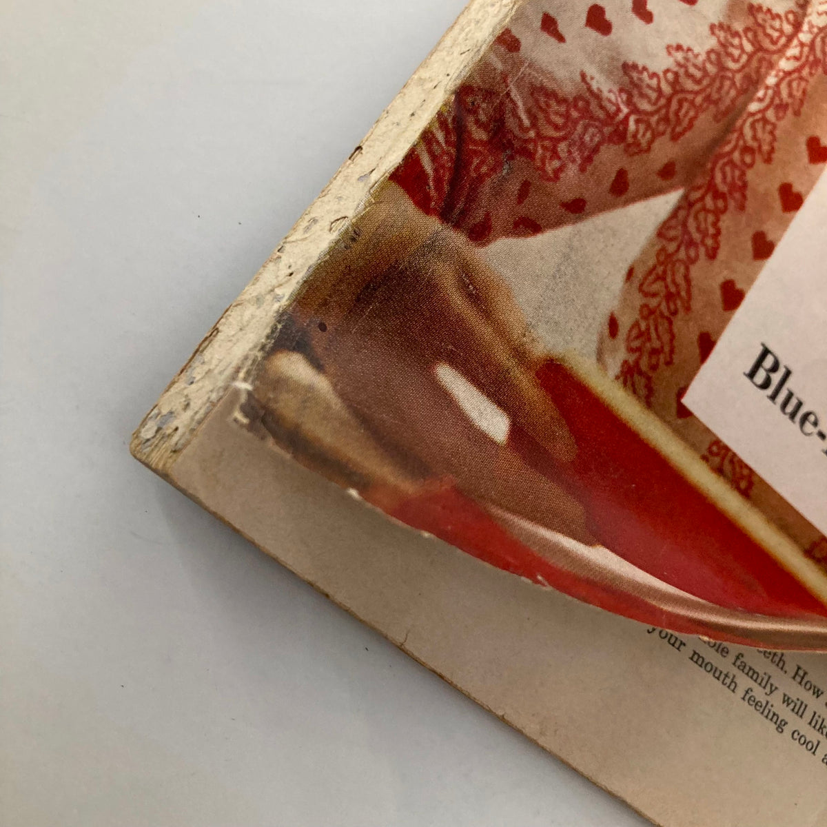 Detail of the spine and cover of VTG Good Housekeeping Magazine September 1956, showing wear typical of vintage magazines.