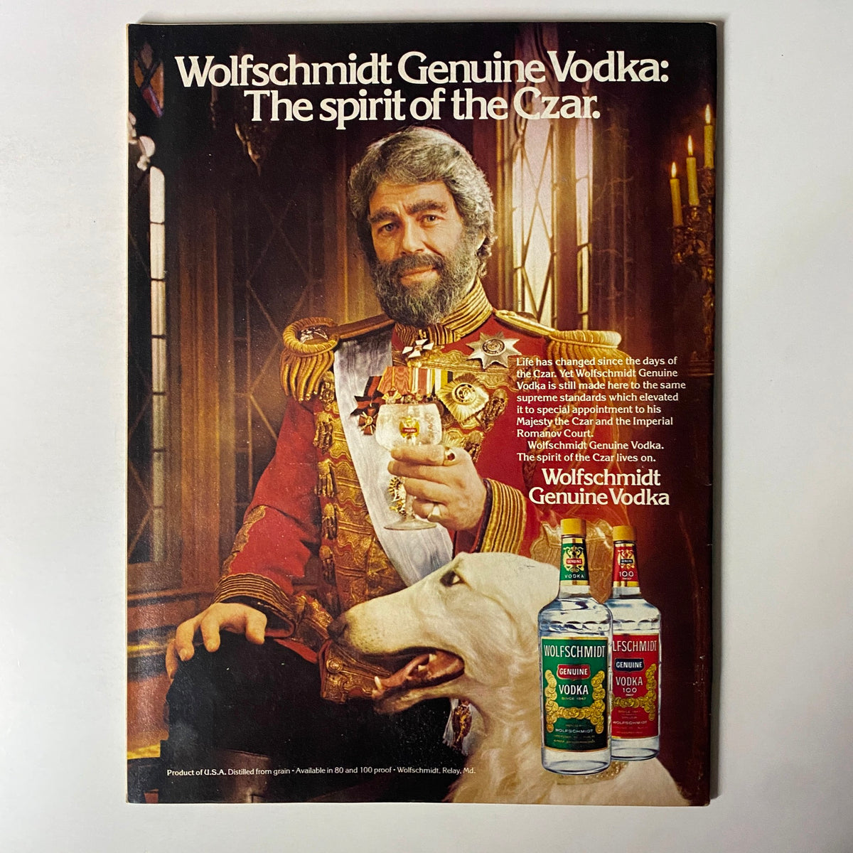 Vintage advertisement for Wolfschmidt Genuine Vodka featured in Forbes Magazine, August 4, 1980, showcasing the product and its historical context.
