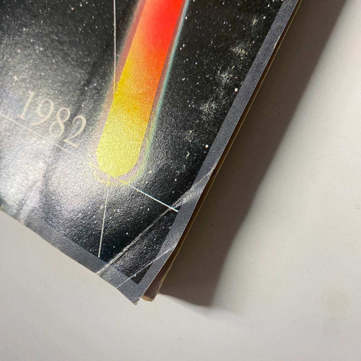 Close-up of the edge of Forbes Magazine dated November 9, 1981, highlighting the theme of economic waves with vibrant colors.