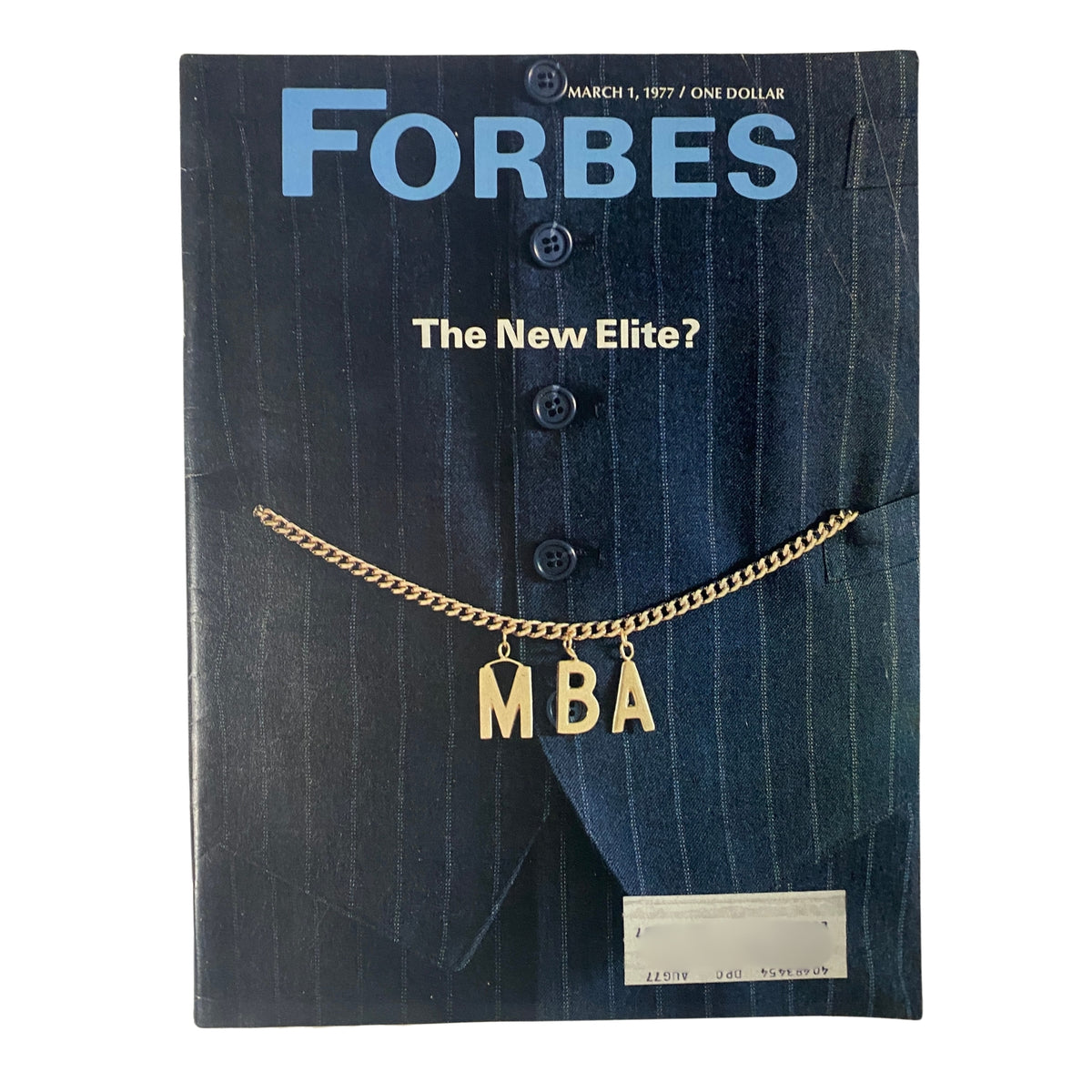 Cover of Forbes Magazine, March 1, 1977, titled 'The New Elite?' featuring a suit and a gold MBA necklace.