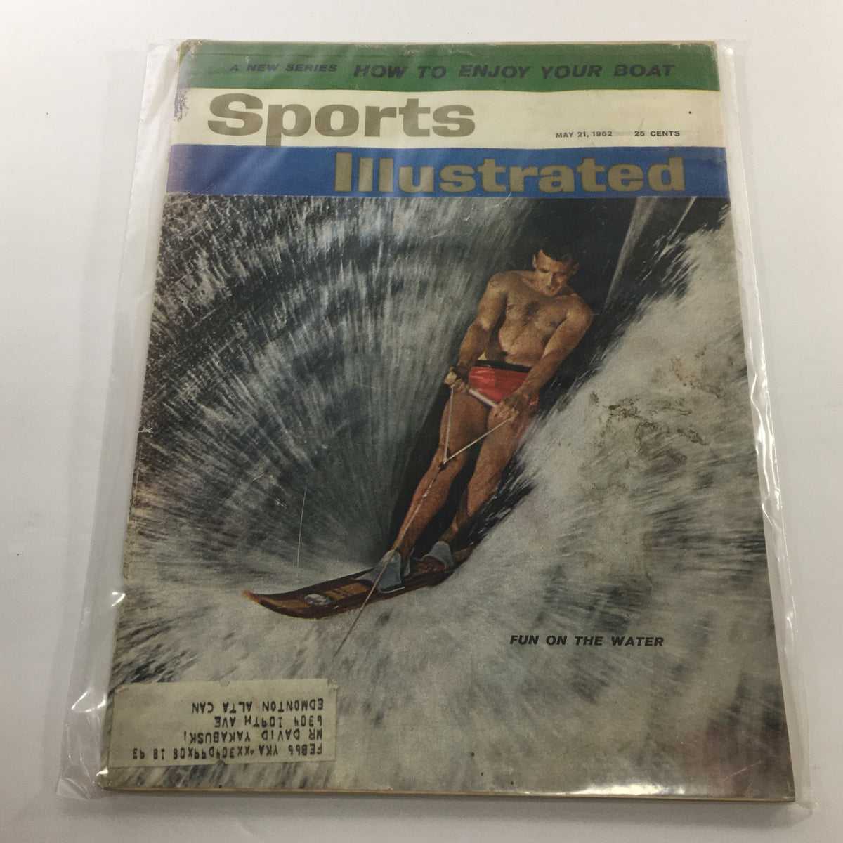 Cover of Sports Illustrated magazine dated May 21, 1962, featuring a man water skiing, with the headline 'How To Enjoy Your Boat' and the phrase 'Fun On The Water', showcasing vintage boating culture.