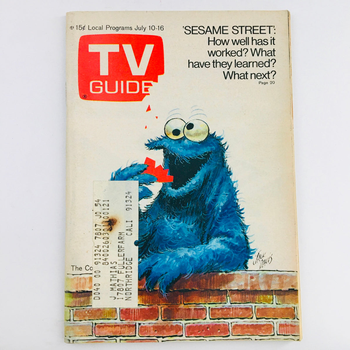 TV Guide July 31 1971 Vol 19 #28 featuring Cookie Monster from Sesame Street on the cover, showing the character munching on a cookie with a vivid illustration.
