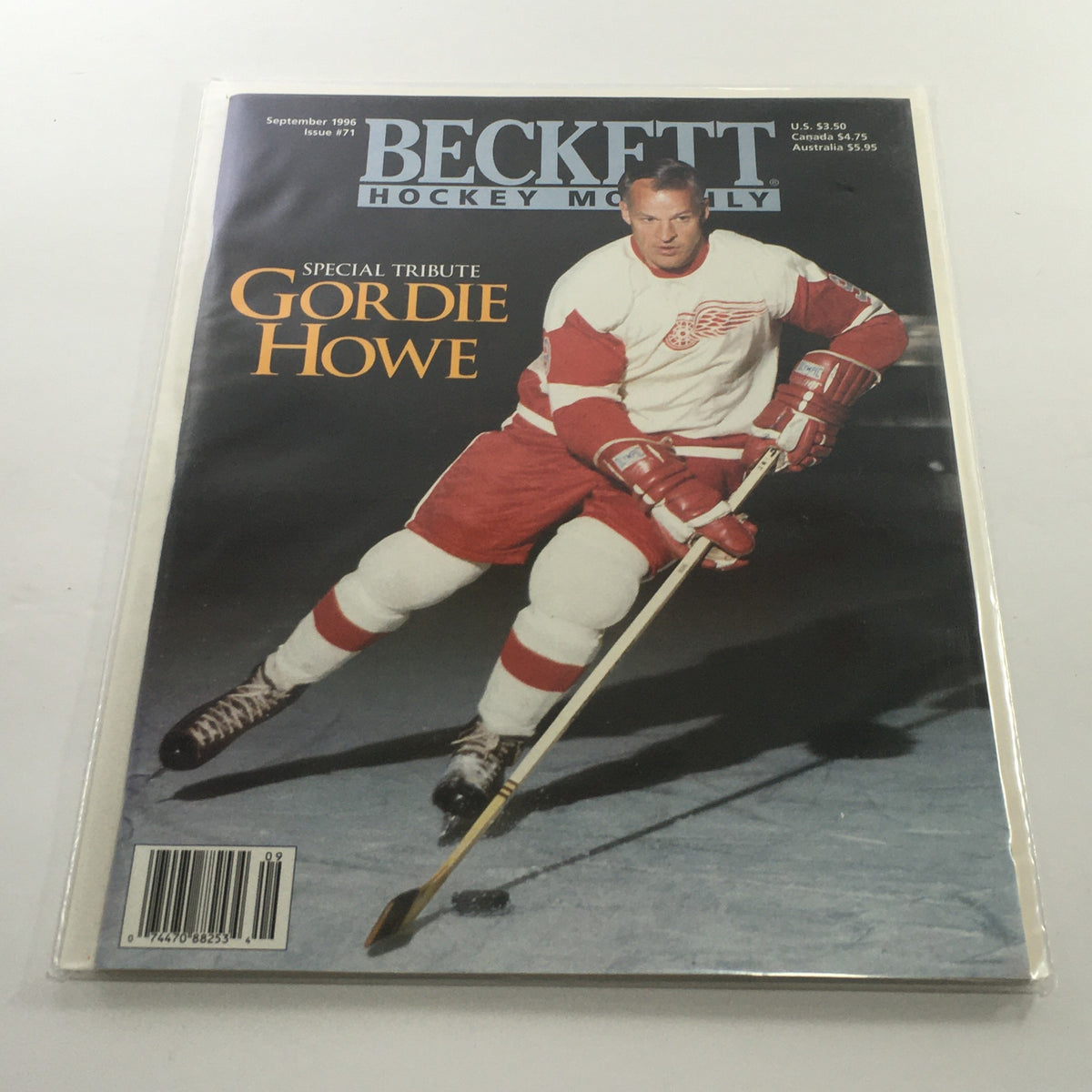 Cover of Beckett Hockey Monthly: September 1996 - Issue #71 featuring a special tribute to Gordie Howe, showcasing an image of the legendary hockey player in action wearing a red and white uniform.