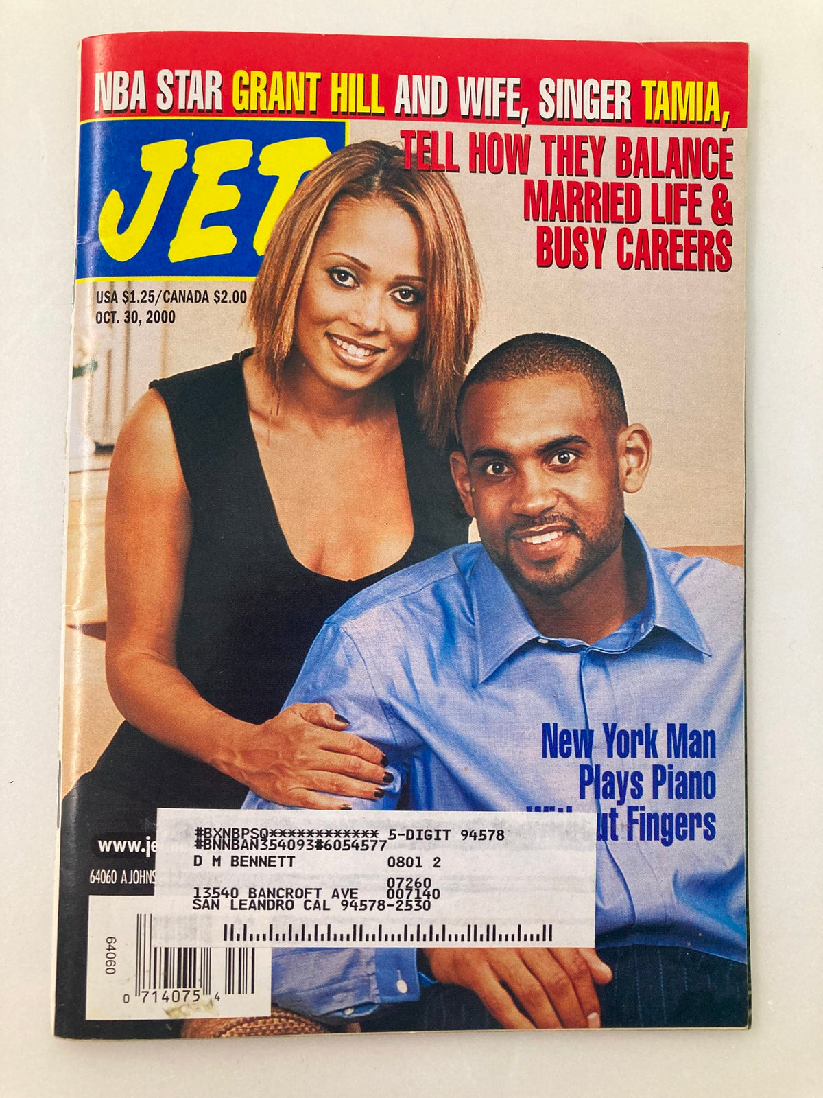 Jet Magazine cover from October 30, 2000, featuring NBA star Grant Hill and his wife, singer Tamia, discussing their balance of married life and busy careers.