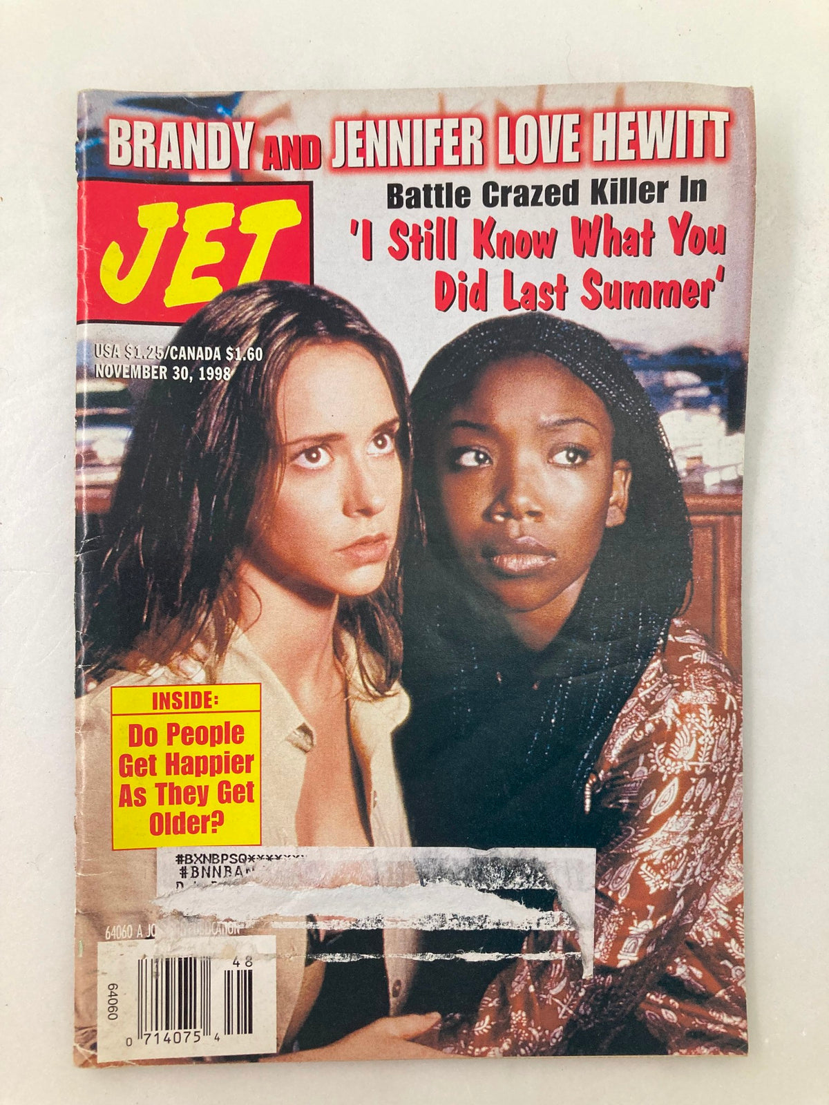Cover of Jet Magazine dated November 30, 1998, showcasing Brandy and Jennifer Love Hewitt with the headline 'Battle Crazed Killer In I Still Know What You Did Last Summer'. The magazine also features an inside article about happiness and aging.