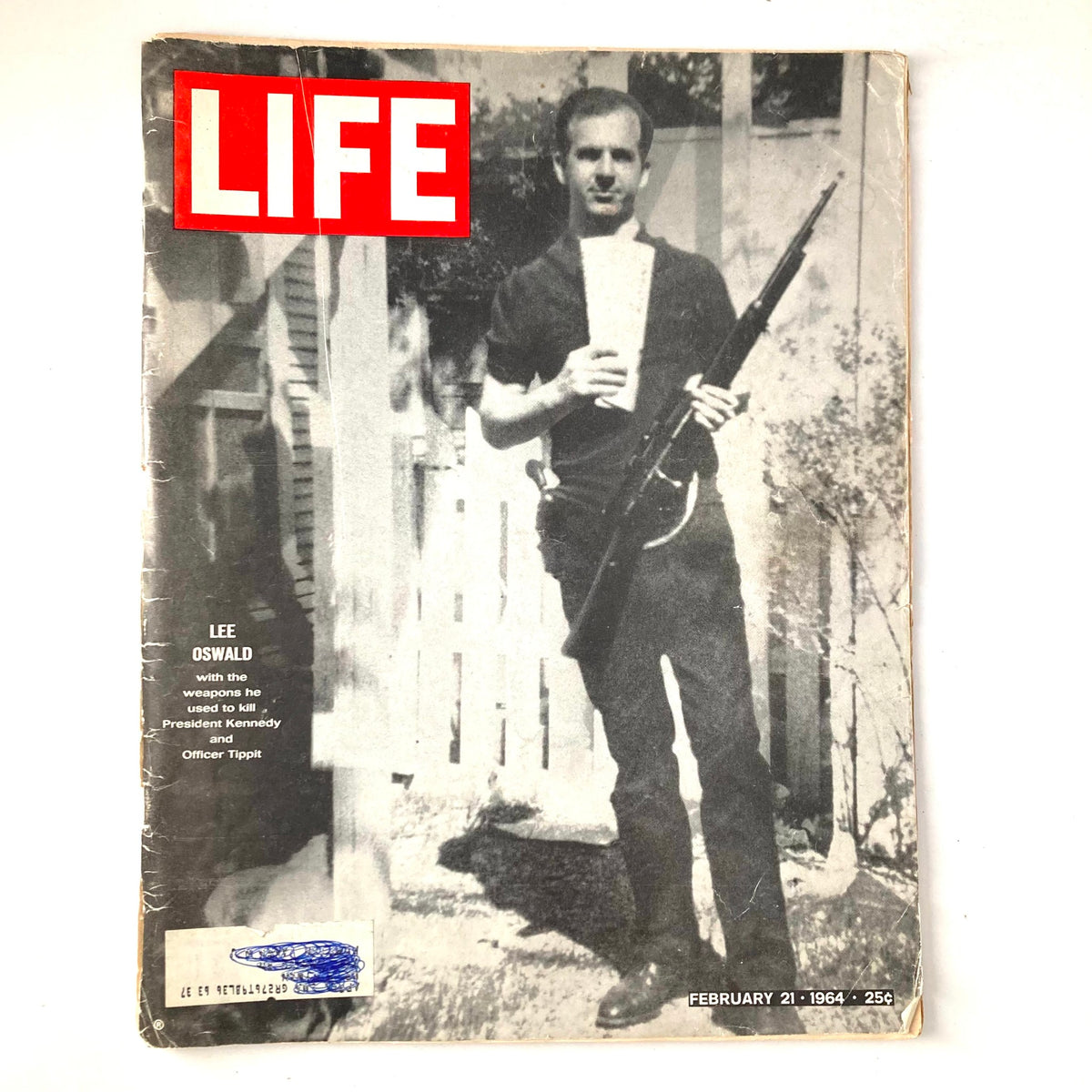 VTG Life Magazine February 21 1964 Cover Image featuring Lee Harvey Oswald holding a rifle, showcasing a pivotal moment in American history.