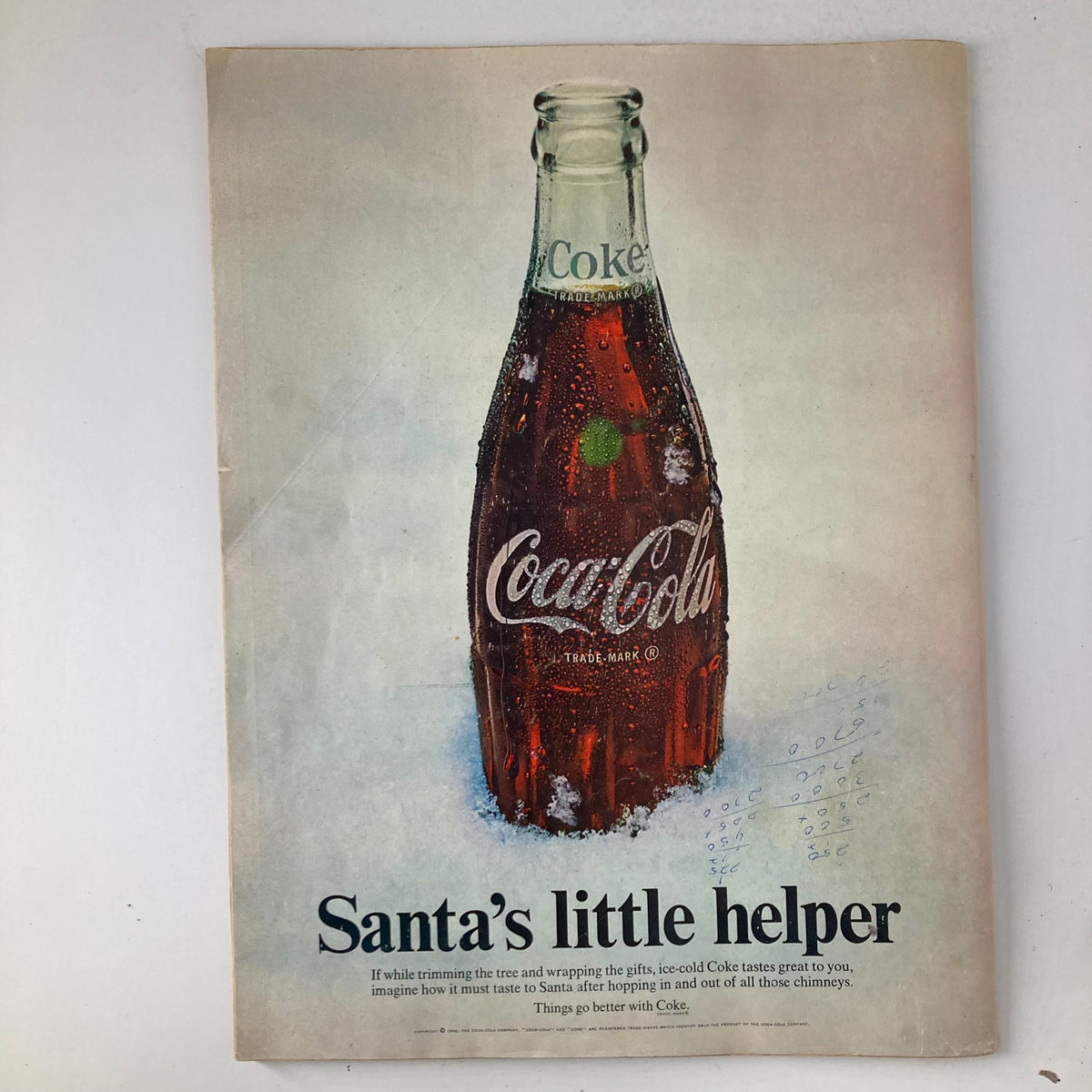 Back cover of VTG Life Magazine December 27 1968 displaying a Coca-Cola advertisement titled 'Santa's little helper', featuring a vintage bottle.