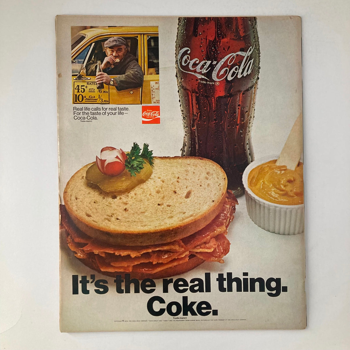Back cover advertisement of VTG Life Magazine May 8 1970 Vol 68 No. 17 featuring a Coca-Cola bottle, a sandwich, and the slogan 'It's the real thing. Coke.'.