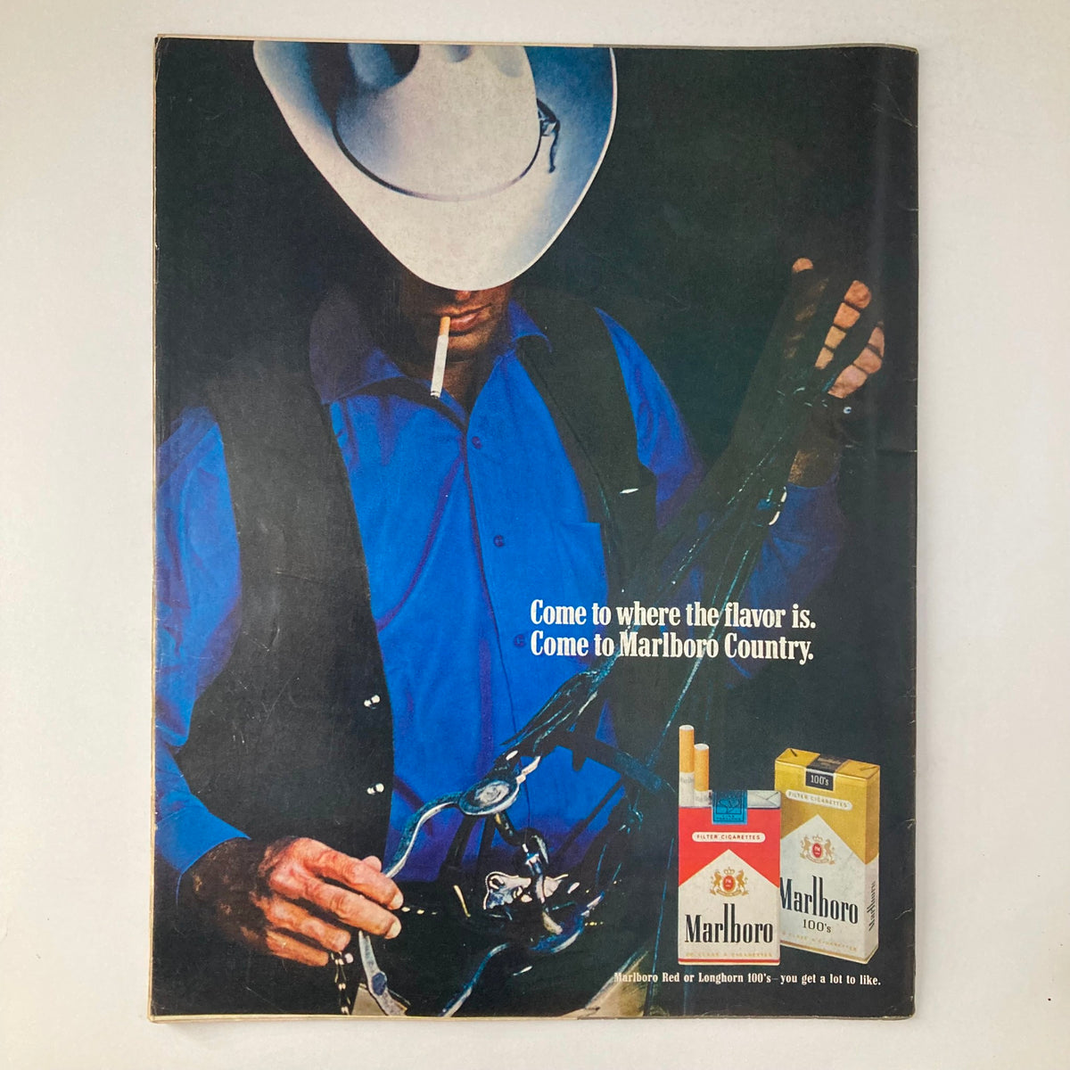 Back cover of VTG Life Magazine January 23, 1970 featuring an advertisement for Marlboro cigarettes with a cowboy holding a cigarette, highlighting vintage Americana.