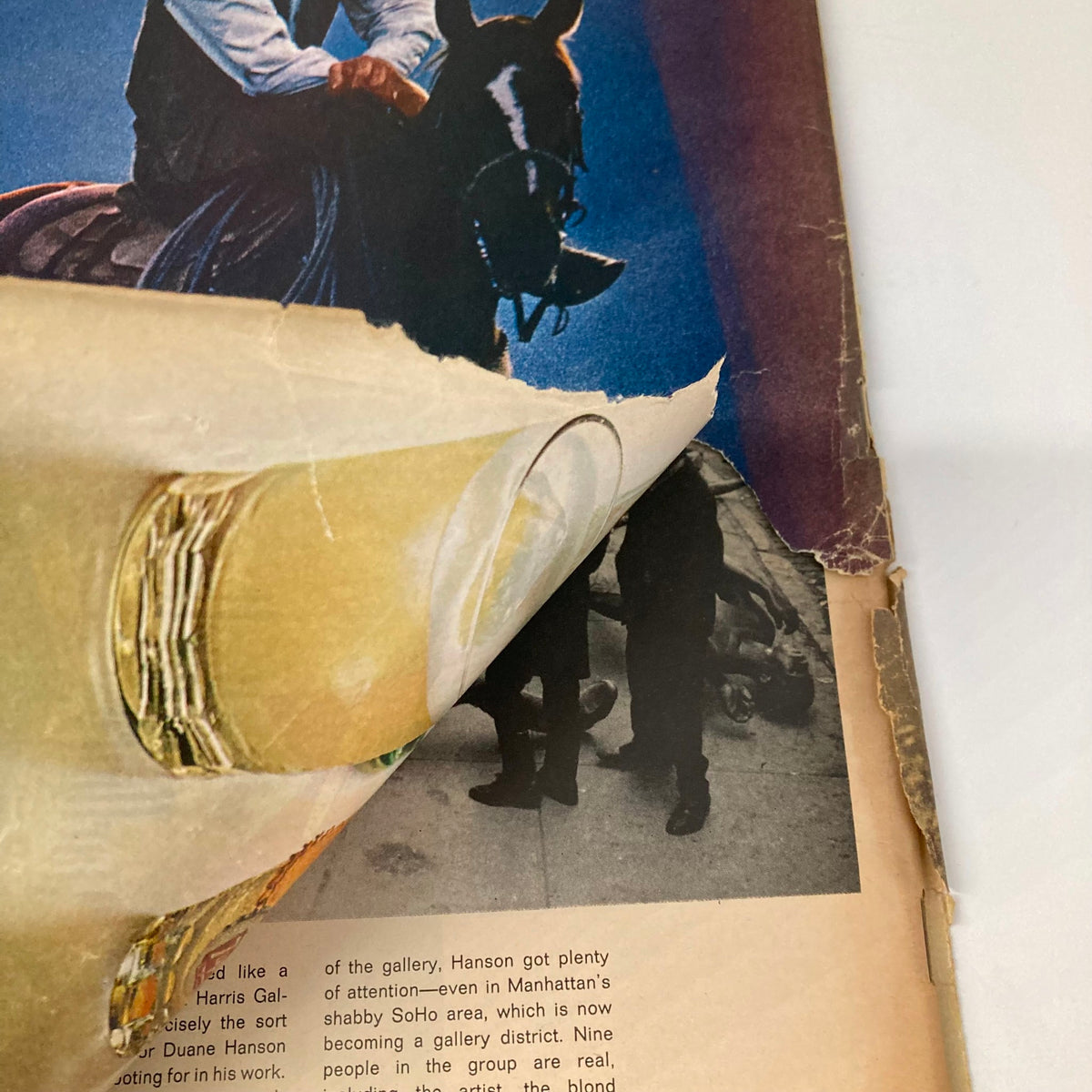 Wear and tear detail of an interior page from VTG Life Magazine, April 24, 1970, highlighting the condition of the pages related to Jim Lovell and Apollo 13.