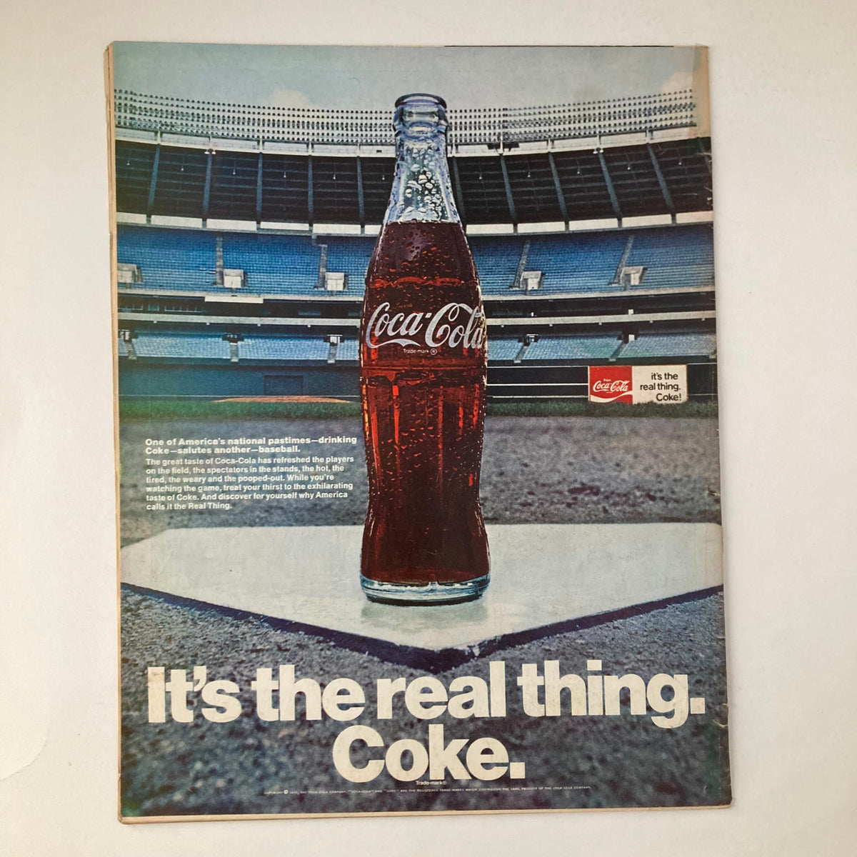 Advertisement page in VTG Life Magazine July 4 1970 Vol 69 No. 1 The Fourth of July Special featuring a Coca-Cola bottle, emphasizing American culture and leisure.