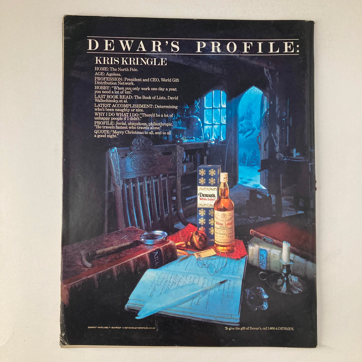 Back cover of VTG Life Magazine December 1987, showcasing an advertisement for Dewar's featuring Kris Kringle, offering a festive holiday ambiance.