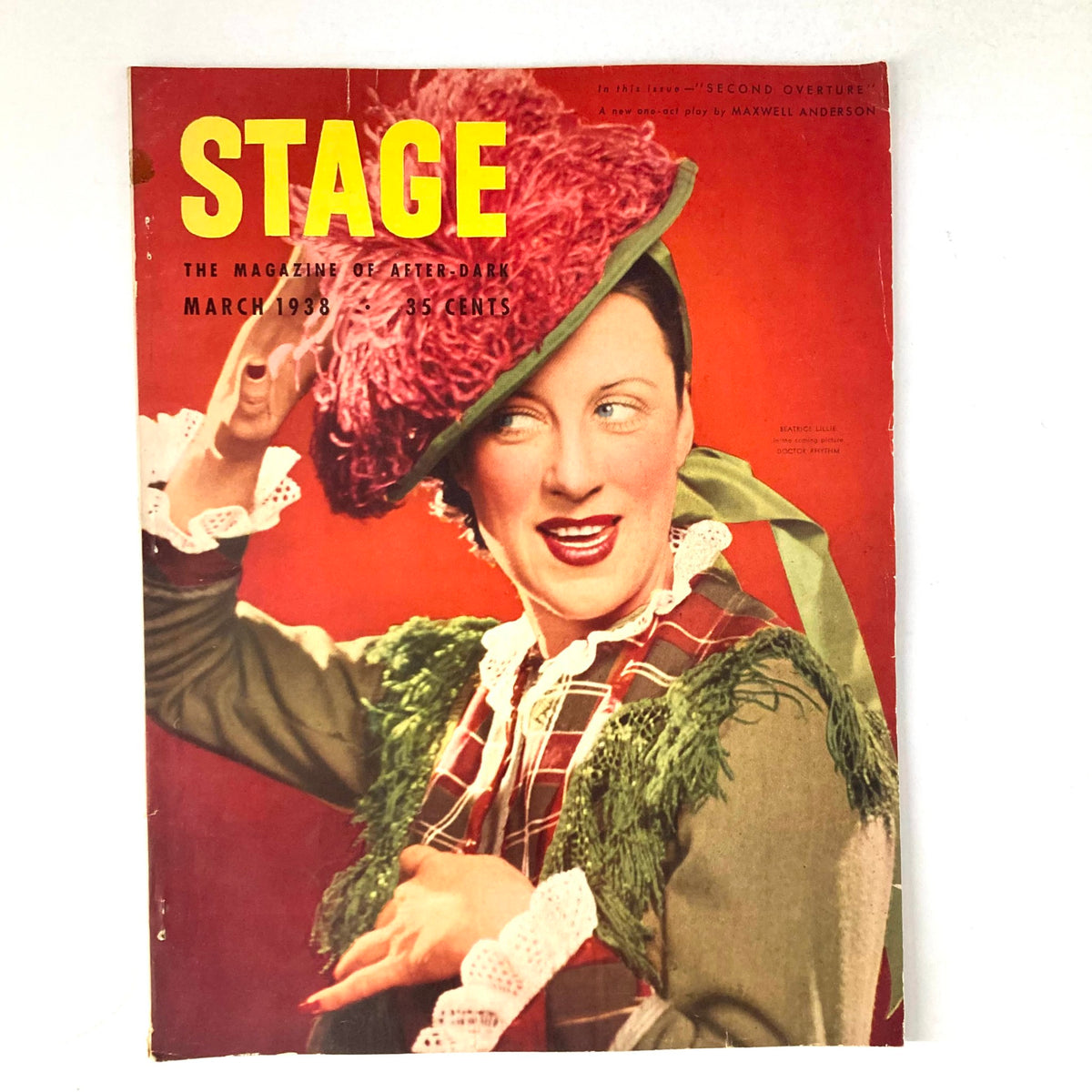 Cover of VTG Stage Magazine March 1938 featuring Beatrice Lillie in 'Doctor Rhythm', showcasing vibrant colors and classic design.