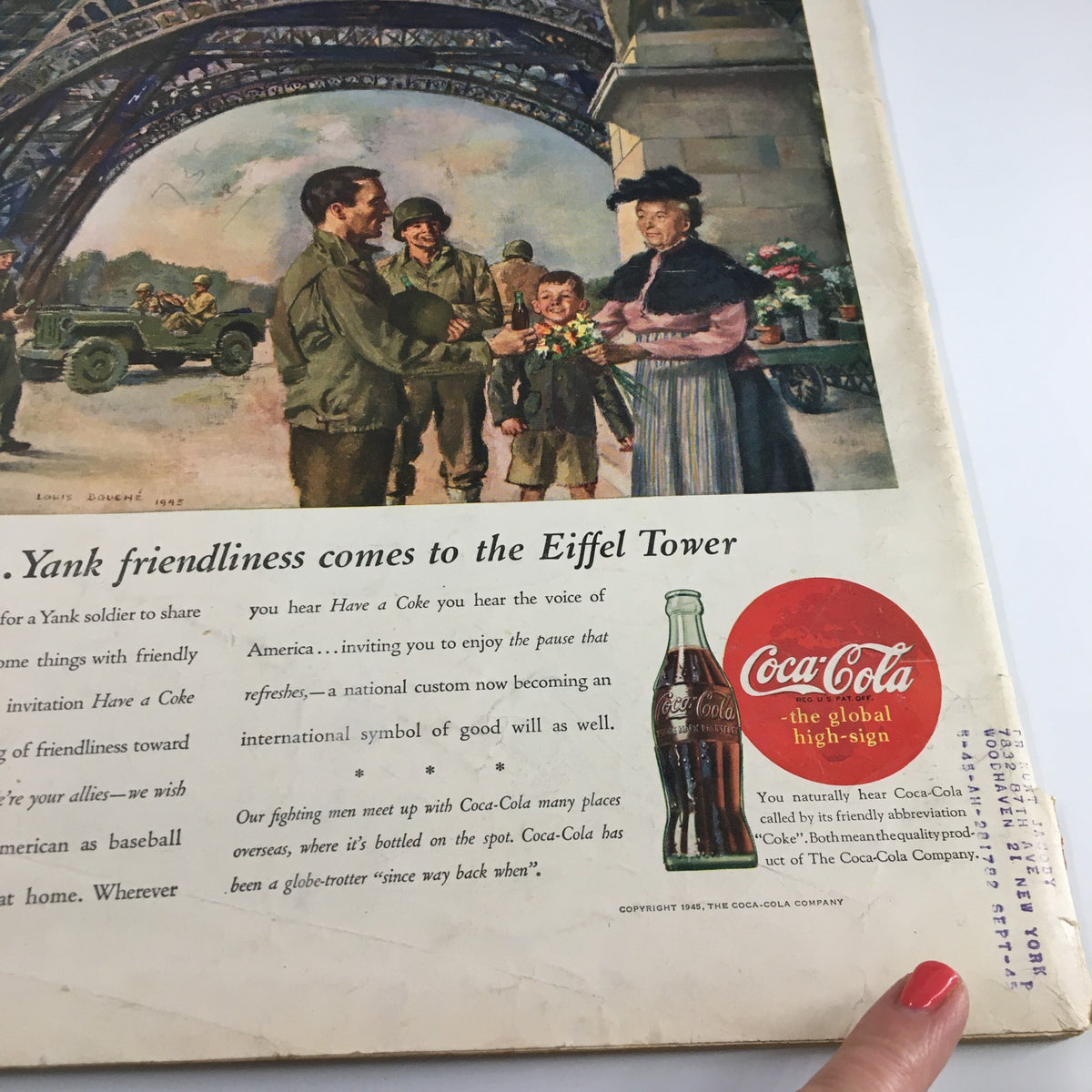 Back cover of VTG Life Magazine July 2, 1945, showcasing an advertisement with soldiers and a Coca-Cola theme, reflecting cultural sentiments of the time.
