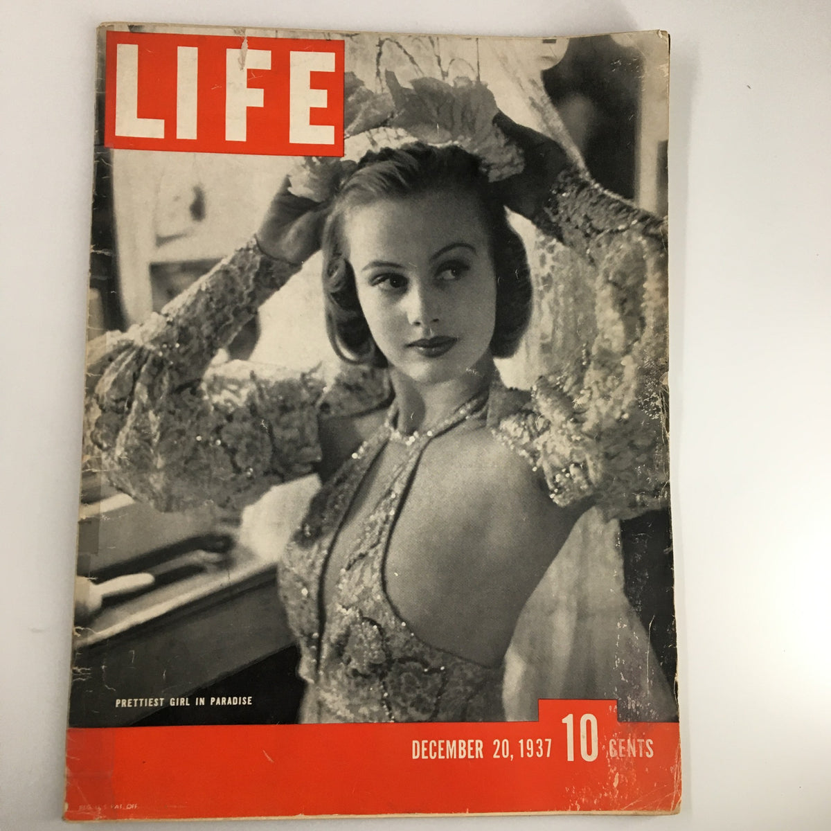 Cover of VTG Life Magazine December 20, 1937 featuring 'The Prettiest Girl in Paradise' showcasing vintage fashion and style.