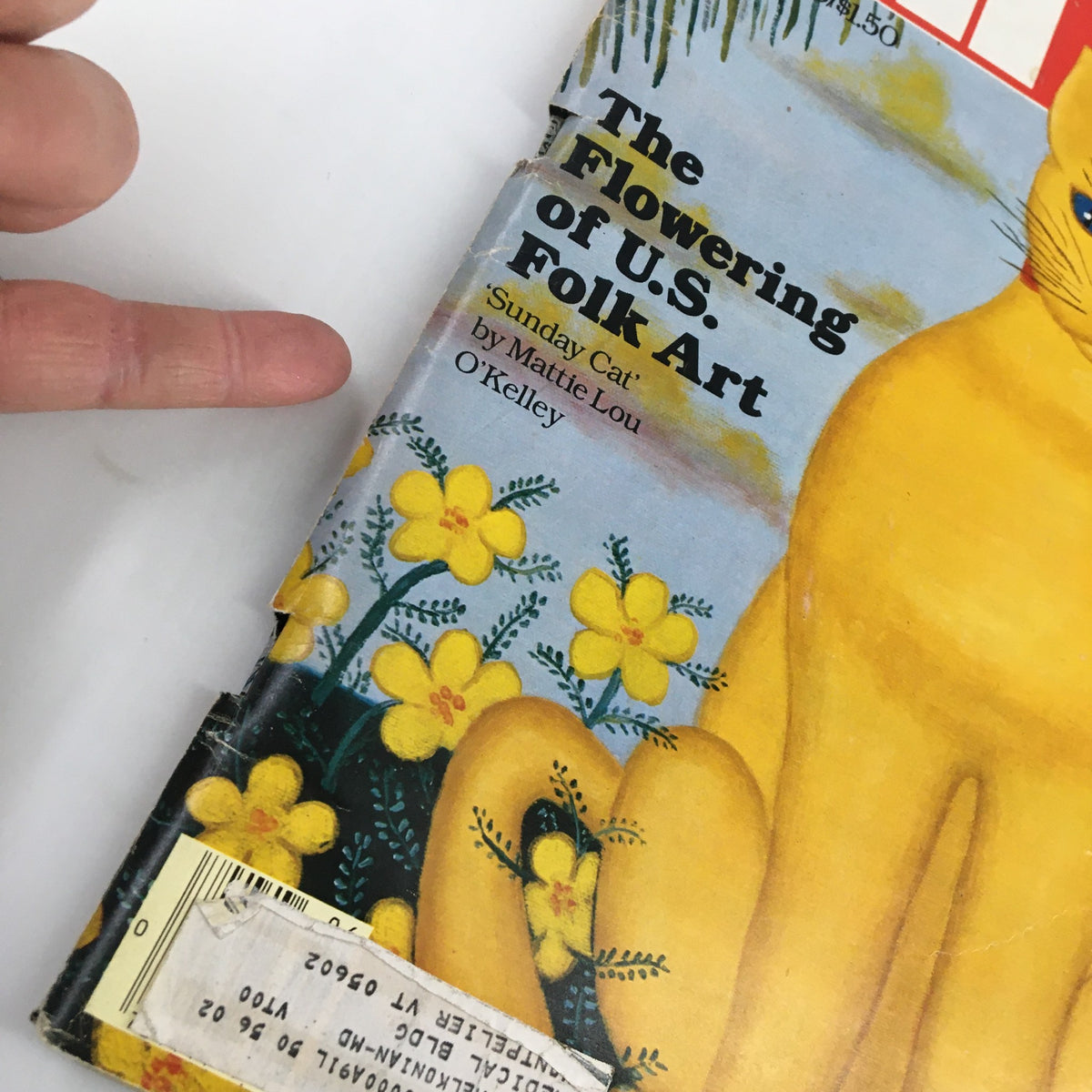Close-up view of the cover of June 1980 Life Magazine, highlighting 'The Flowering of U.S. Folk Art' and the artwork 'Sunday Cat' by Mattie Lou O'Kelley.