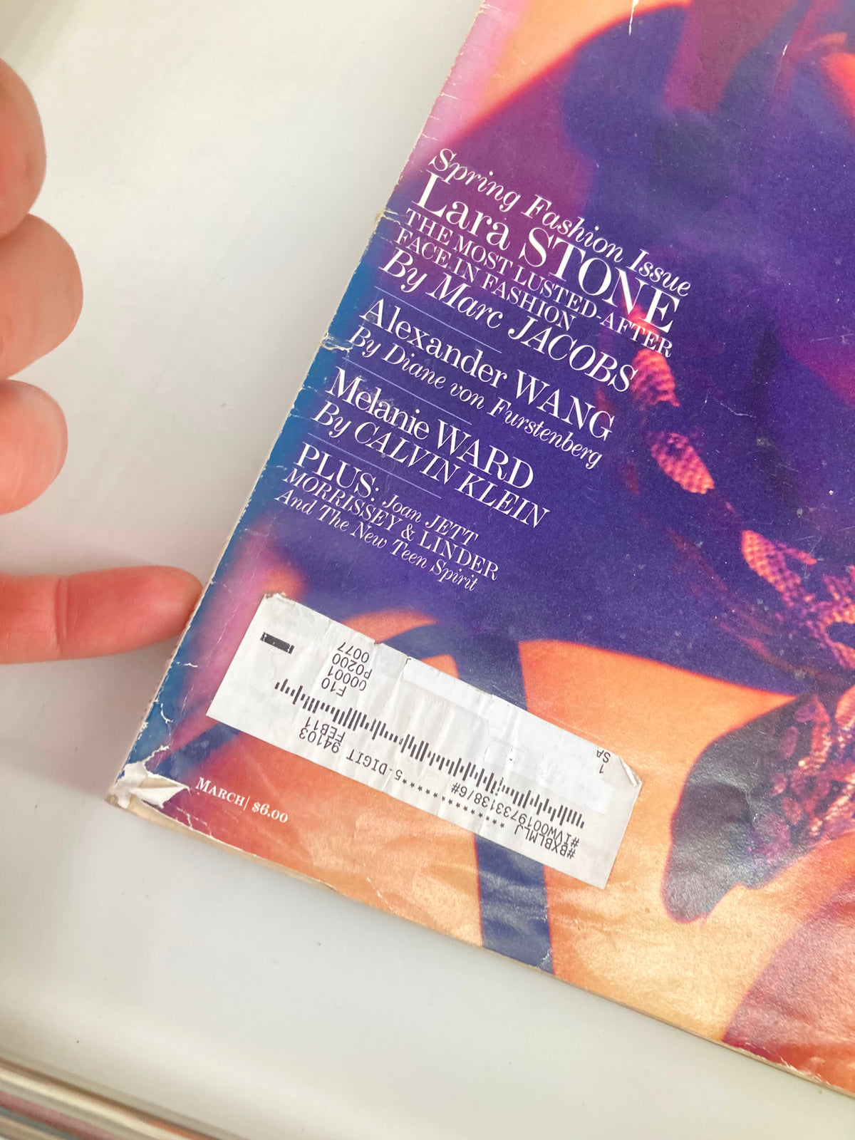Close-up view of the corner of Interview Magazine March 2010, displaying details including the spine and label information.
