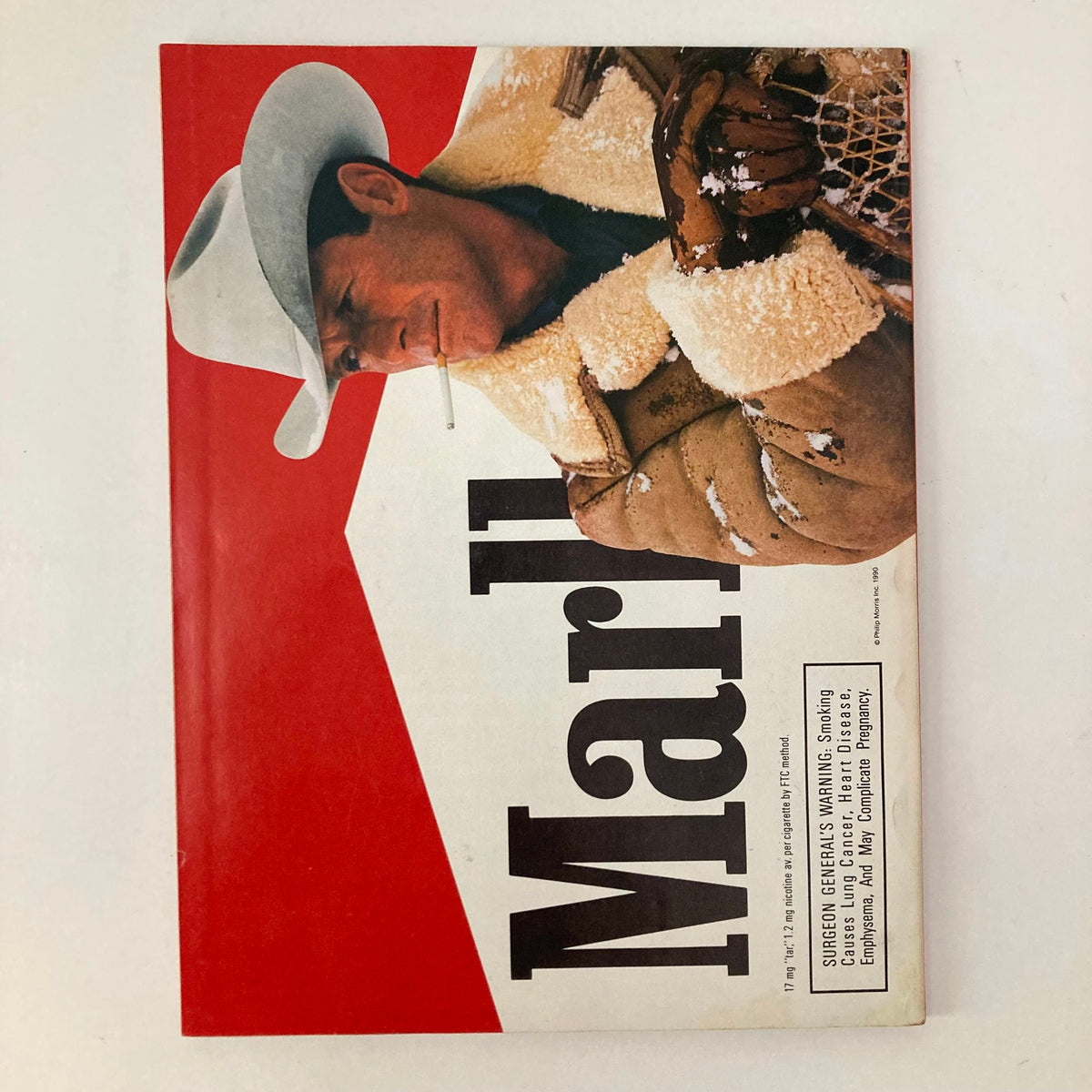 Cover image of Road & Track Magazine January 1991 featuring a prominent figure in a cowboy hat, signifying classic automotive culture.