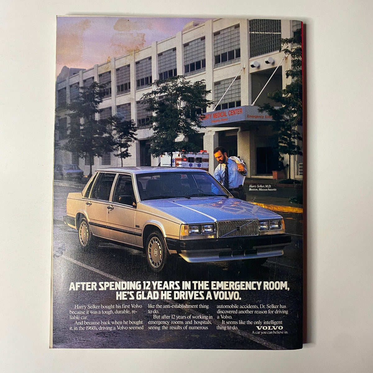 Forbes Magazine January 9, 1989 cover featuring an advertisement with a man beside a silver Volvo outside a medical center, highlighting the importance of vehicle safety in emergency situations.