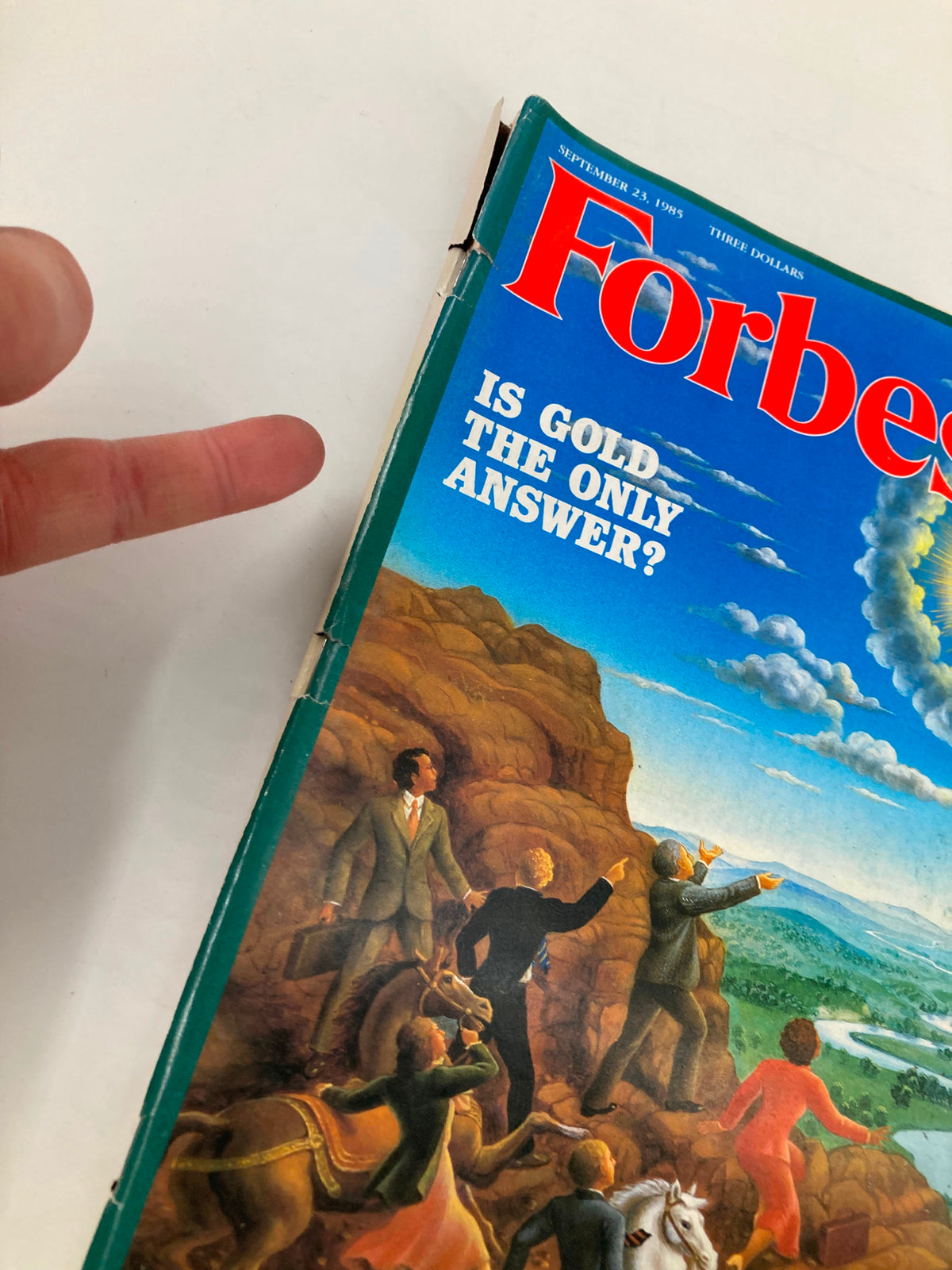 Close-up view of the spine of the VTG Forbes Magazine from September 23, 1985, displaying the title 'Is Gold The Only Answer?' along with details of the cover art.