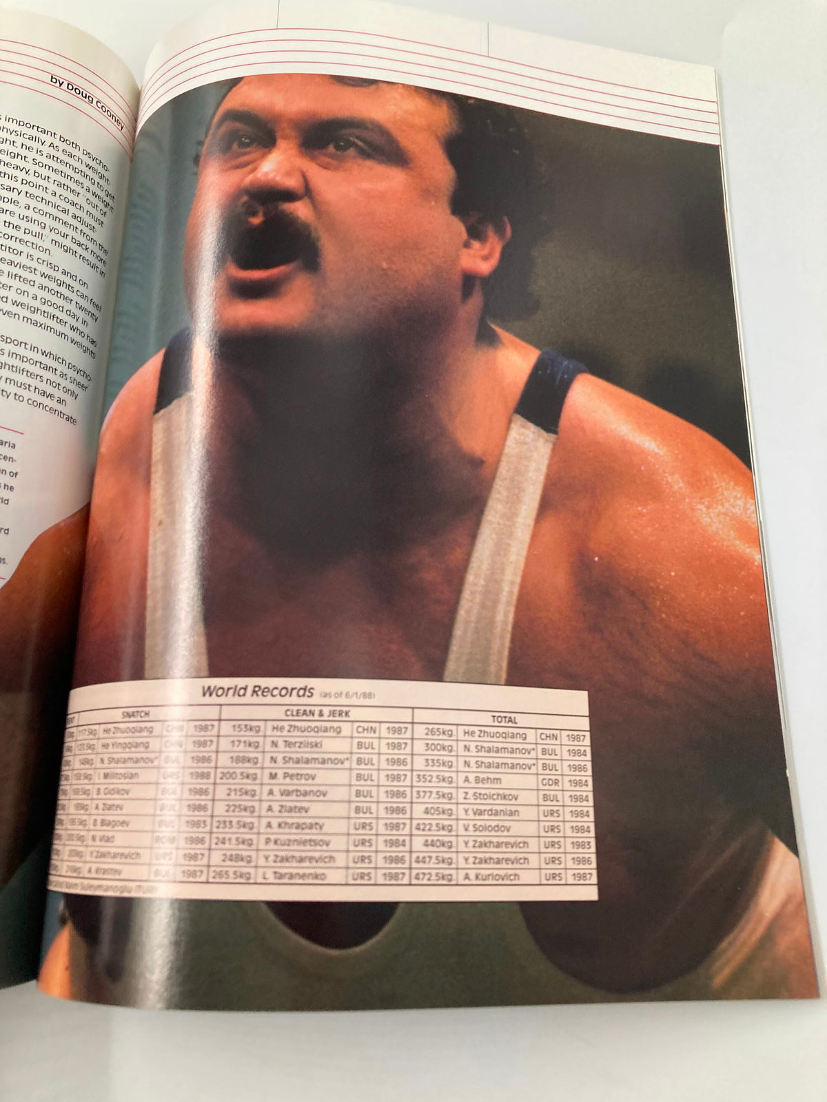 VTG 1988 Olympic Games Seoul Official NBC Viewer's Guide featuring a page displaying world records in weightlifting, showcasing athletes' achievements and statistics.