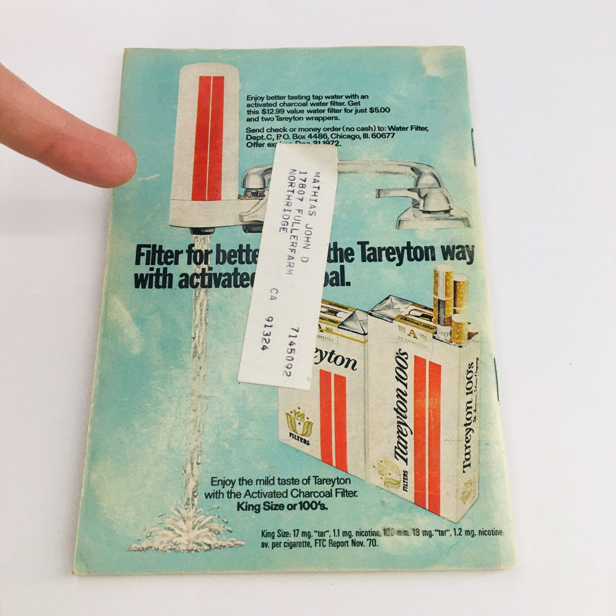 Back cover of the TV Guide from July 31, 1971, edition featuring a vintage advertisement for Tareyton cigarettes and a water filter, showcasing nostalgic marketing from the era.