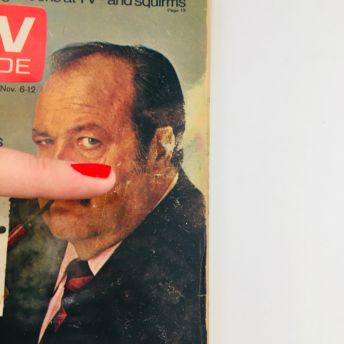 Close-up of the TV Guide cover from November 6, 1971, highlighting William Conrad of 'Cannon', Los Angeles CA, with a finger pointing at the image.