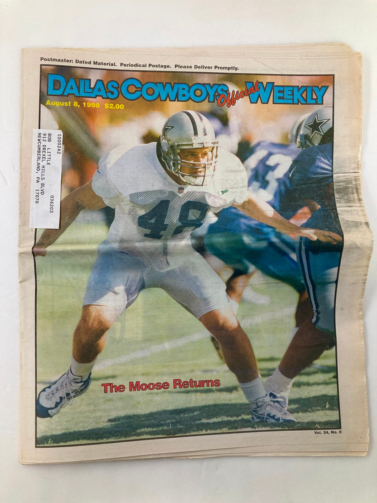 Cover of Dallas Cowboys Weekly Newspaper August 8, 1998, featuring football player in action, titled 'The Moose Returns'.