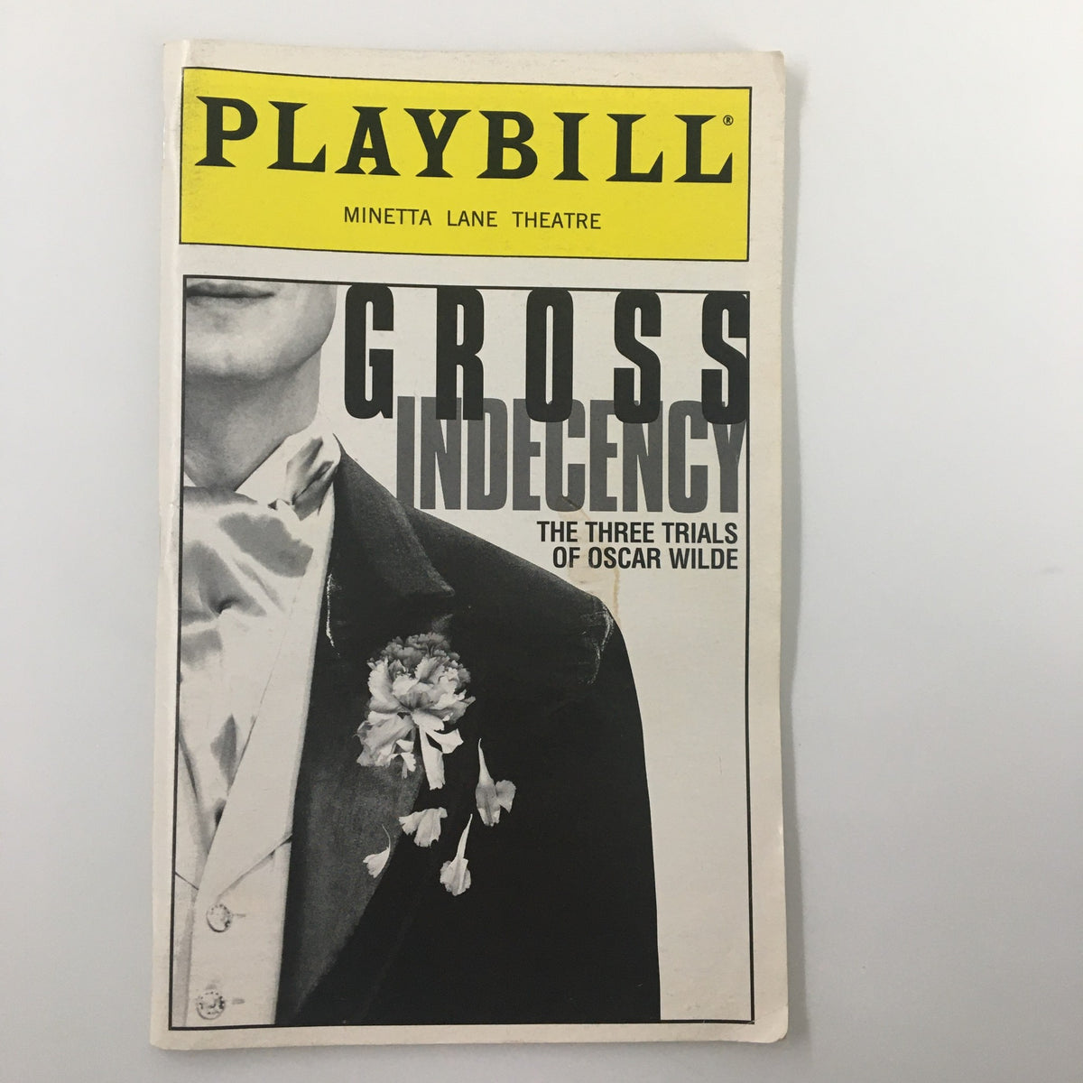 1997 Playbill for Gross Indecency: The Three Trials of Oscar Wilde at Minetta Lane Theatre, featuring a classic black and white cover design.