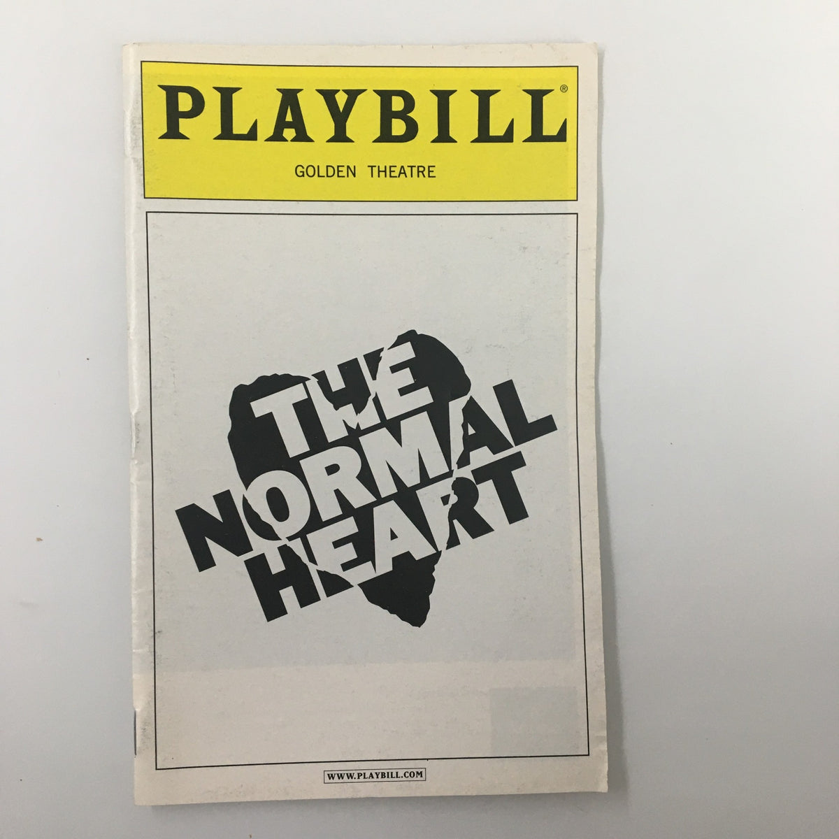 2011 Playbill for Larry Kramer's The Normal Heart at Golden Theatre, featuring a bold graphic design with the title prominently displayed.