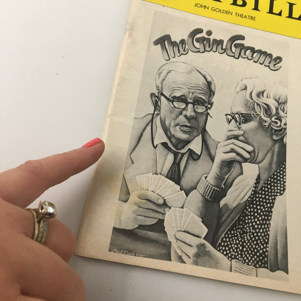 Cover of the 1978 Playbill for The Gin Game by D.L. Coburn, featuring a hand pointing at two characters deep in a card game.