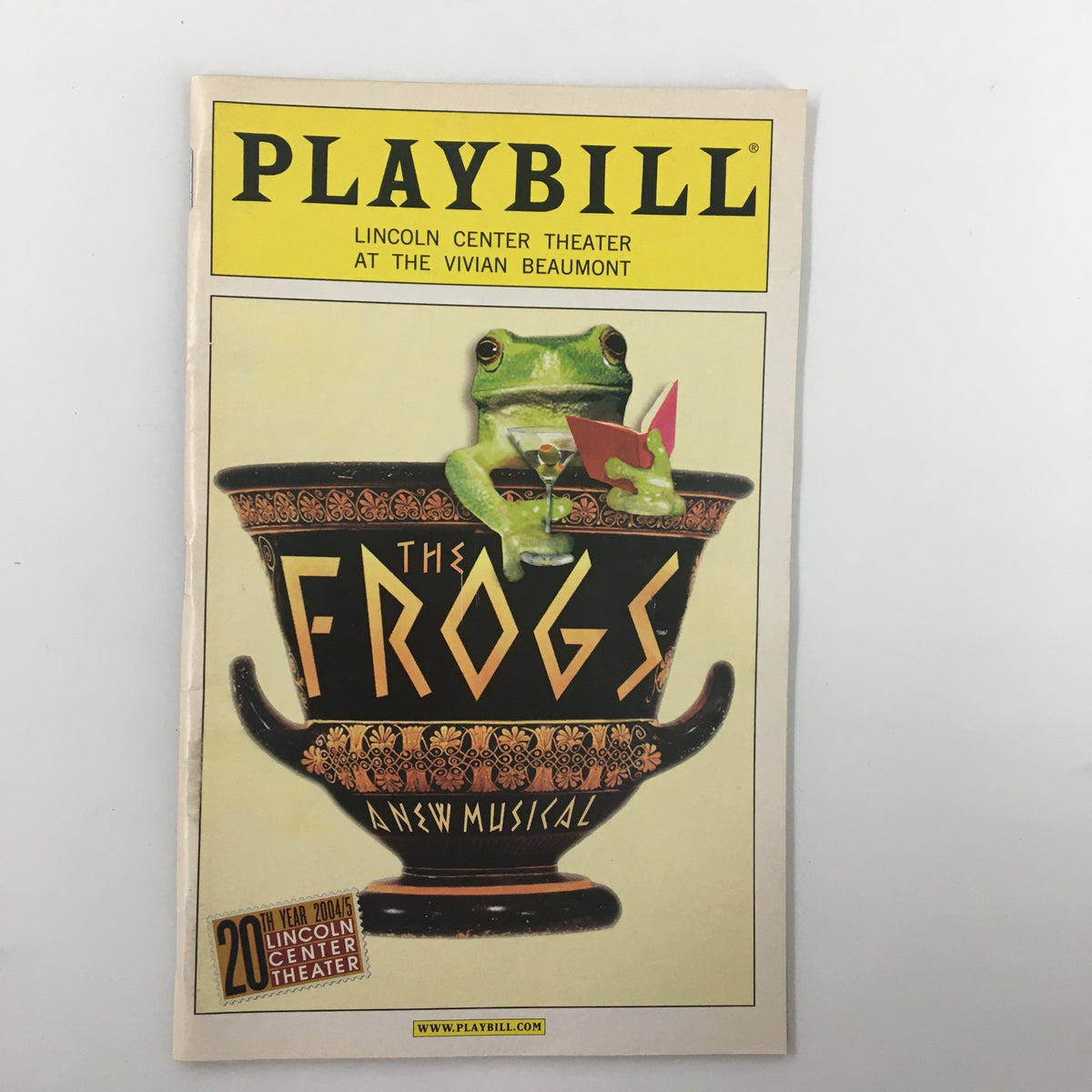 2004 Playbill for Lincoln Center Theatre's The Frogs featuring vibrant cover art with a frog holding a cocktail, showcasing a new musical by Susan Stroman.
