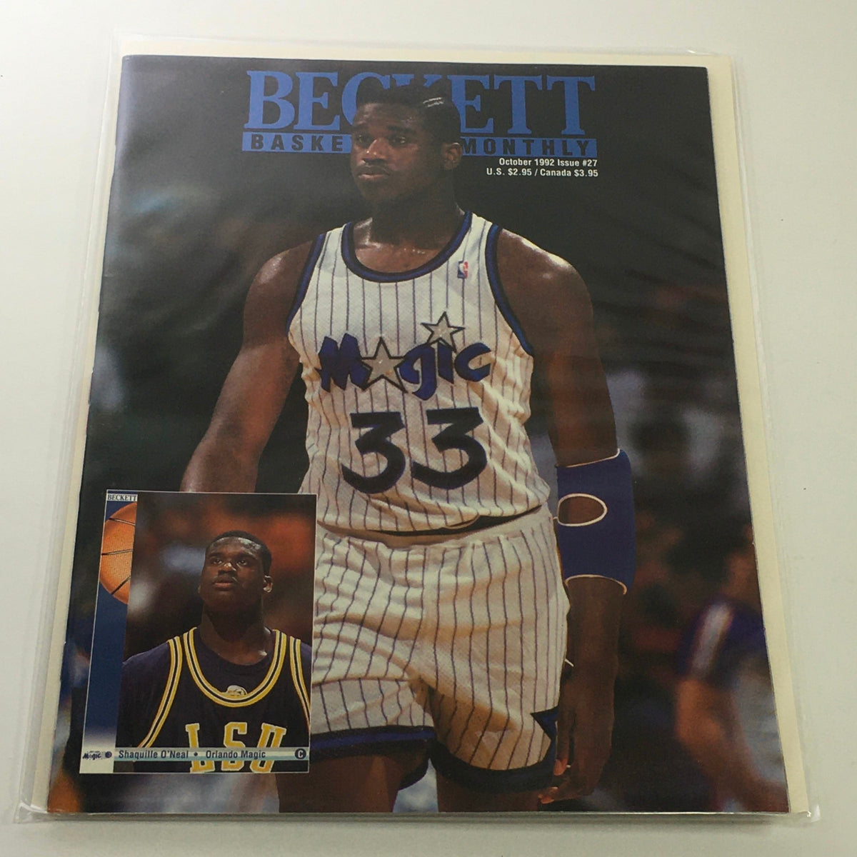 Beckett Basketball Monthly October 1992 Issue #27 featuring Shaquille O'Neal on the cover, showcasing Shaquille in a Magic jersey with a basketball card image in the corner.