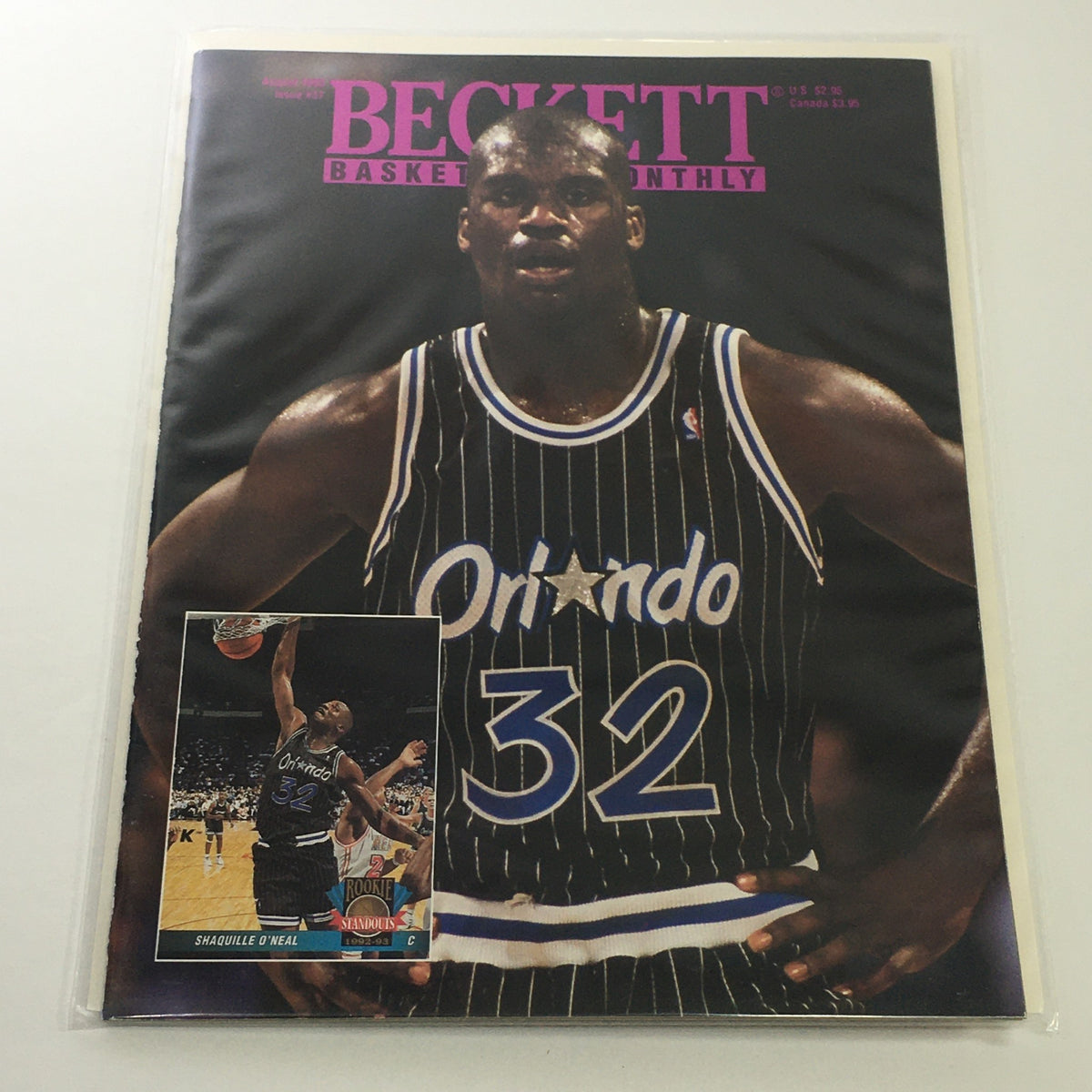 Beckett Basketball Monthly August 1993 Issue #37 featuring Shaquille O'Neal on the cover, showcasing the athlete in an Orlando Magic uniform.