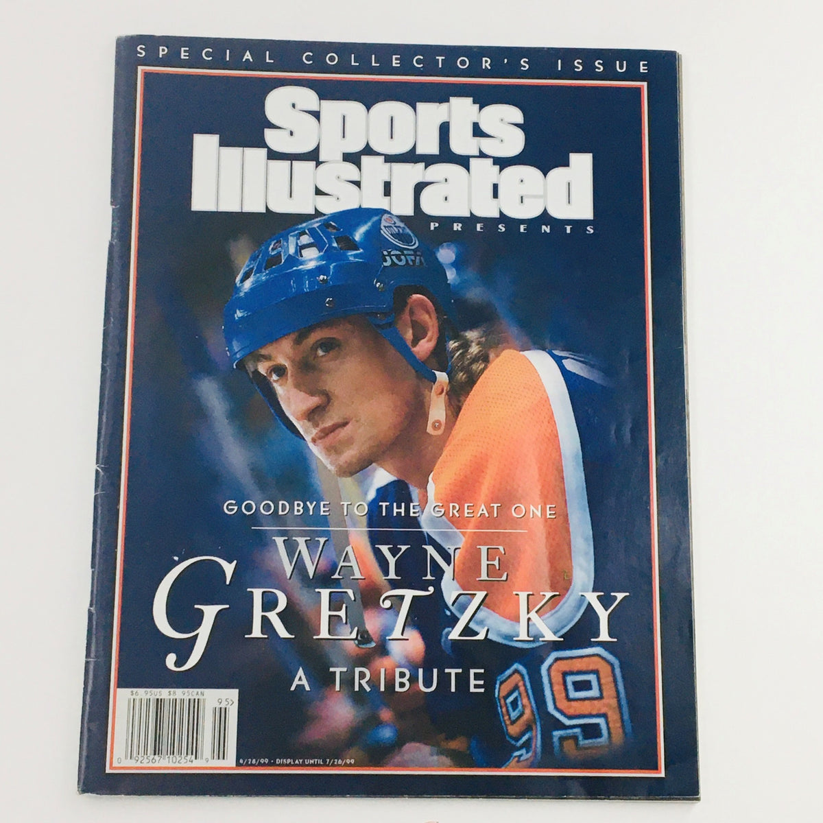 Cover of Sports Illustrated Magazine April 28 1999 featuring Wayne Gretzky A Tribute. The cover displays a photo of Wayne Gretzky in a hockey helmet and jersey, with the text 'GOODBYE TO THE GREAT ONE' prominently featured.