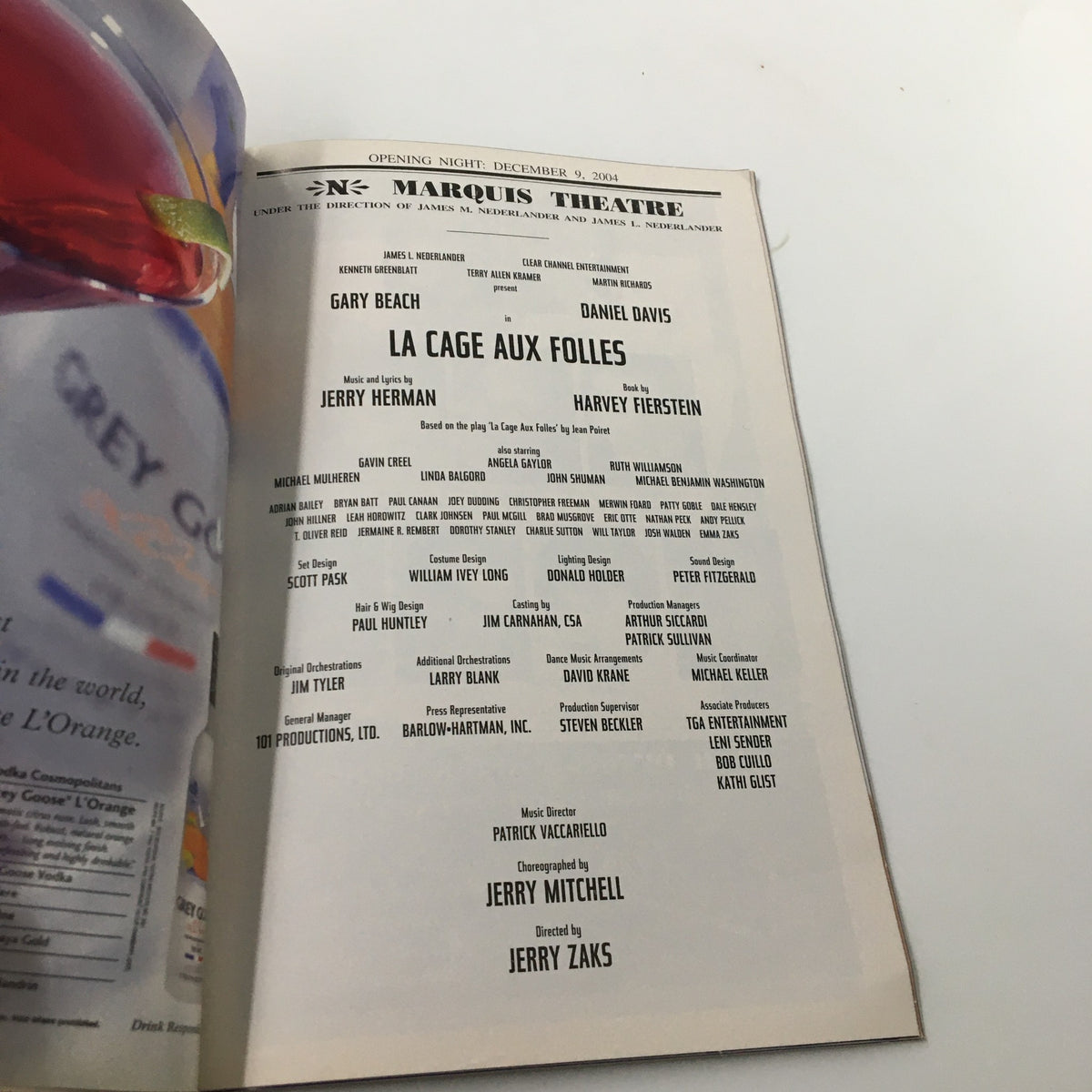 2004 Playbill from the Marquis Theatre featuring Gary Beach in La Cage Aux Folles, showcasing the cast list and production details.