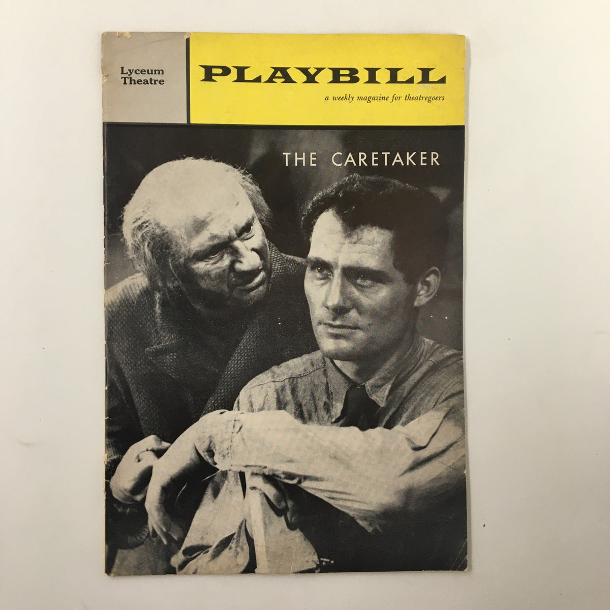 1962 Playbill from the Lyceum Theatre featuring Donald Pleasance and Robert Shaw in The Caretaker, showcasing a vintage cover with a dramatic image.