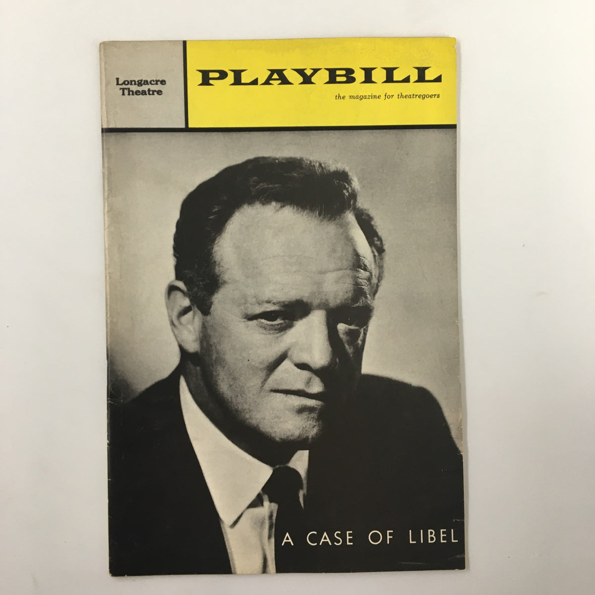 1963 Playbill from Longacre Theatre featuring the play 'A Case of Libel' with a black and white portrait of a male actor on the cover.
