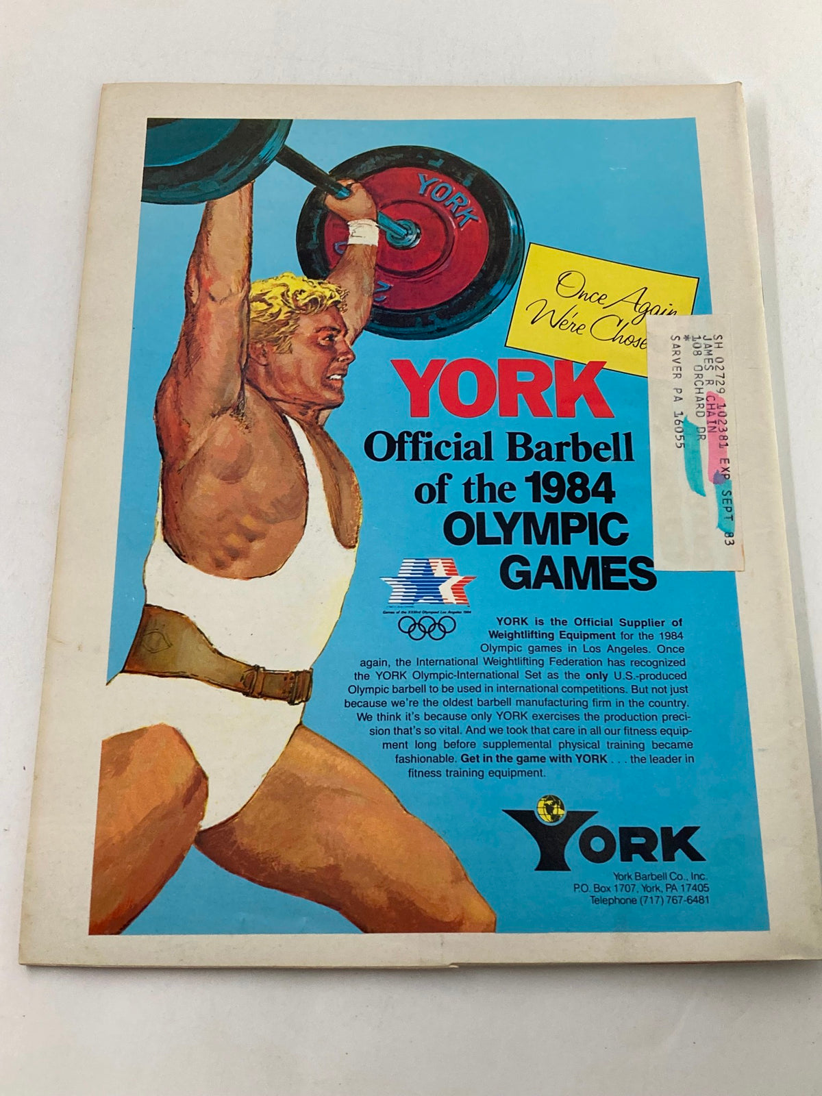 Back cover of VTG Strength & Health Magazine July 1983 Vol 51 #4, advertising the York barbell, emphasizing its role in the 1984 Olympic Games.