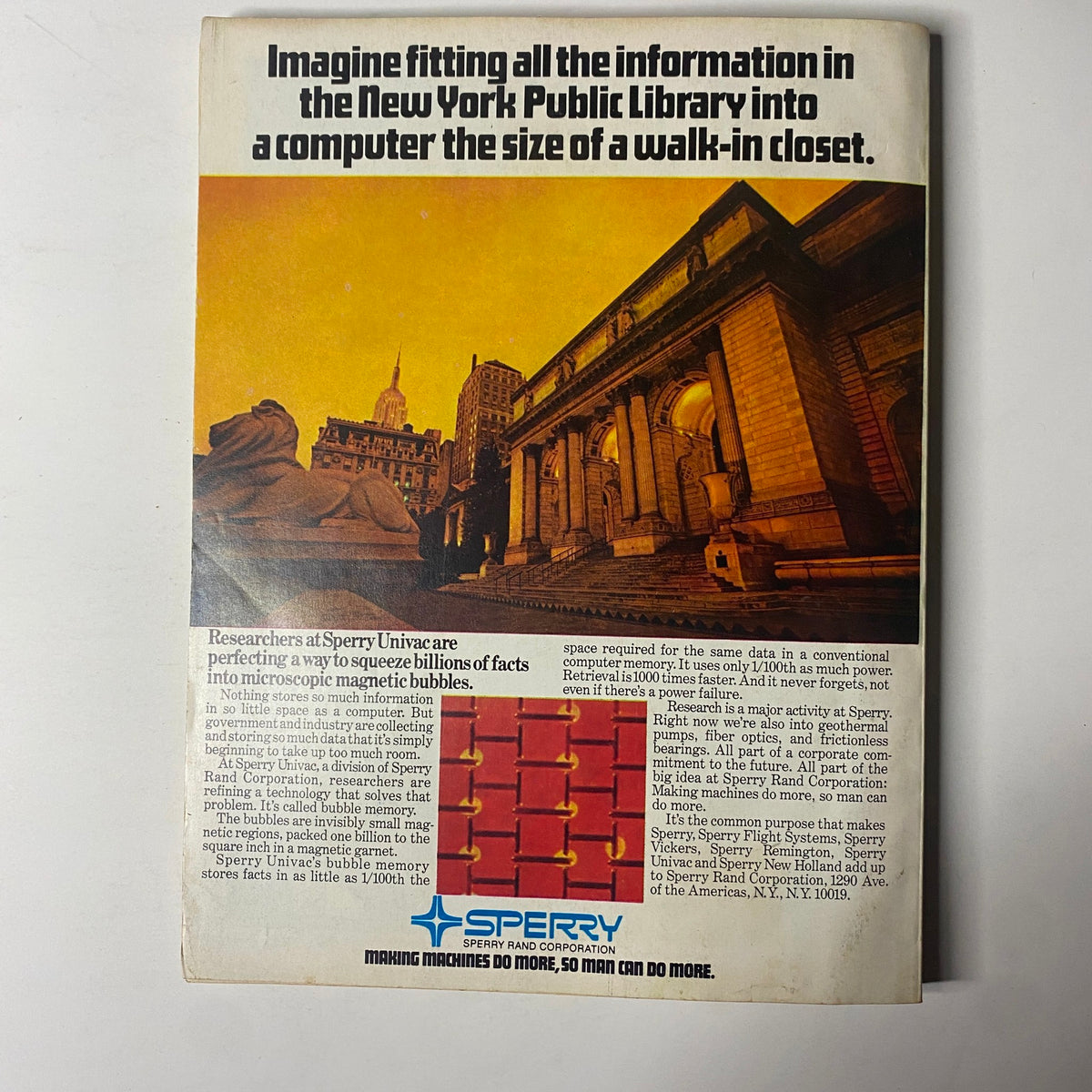 Back cover of Forbes Magazine May 15, 1977 featuring an advertisement for Sperry Univac. The image showcases the New York Public Library and discusses technological advancements in computer memory, highlighting how it can fit vast amounts of information into compact systems.