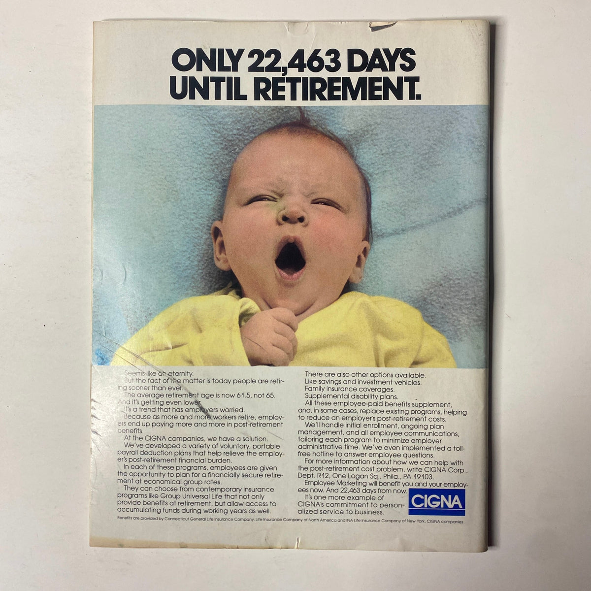 Back cover of Forbes Magazine August 10, 1987, featuring a humorous ad with a yawning baby and the text 'ONLY 22,463 DAYS UNTIL RETIREMENT.' This image highlights the concept of retirement planning, relevant to financial discussions in the magazine.