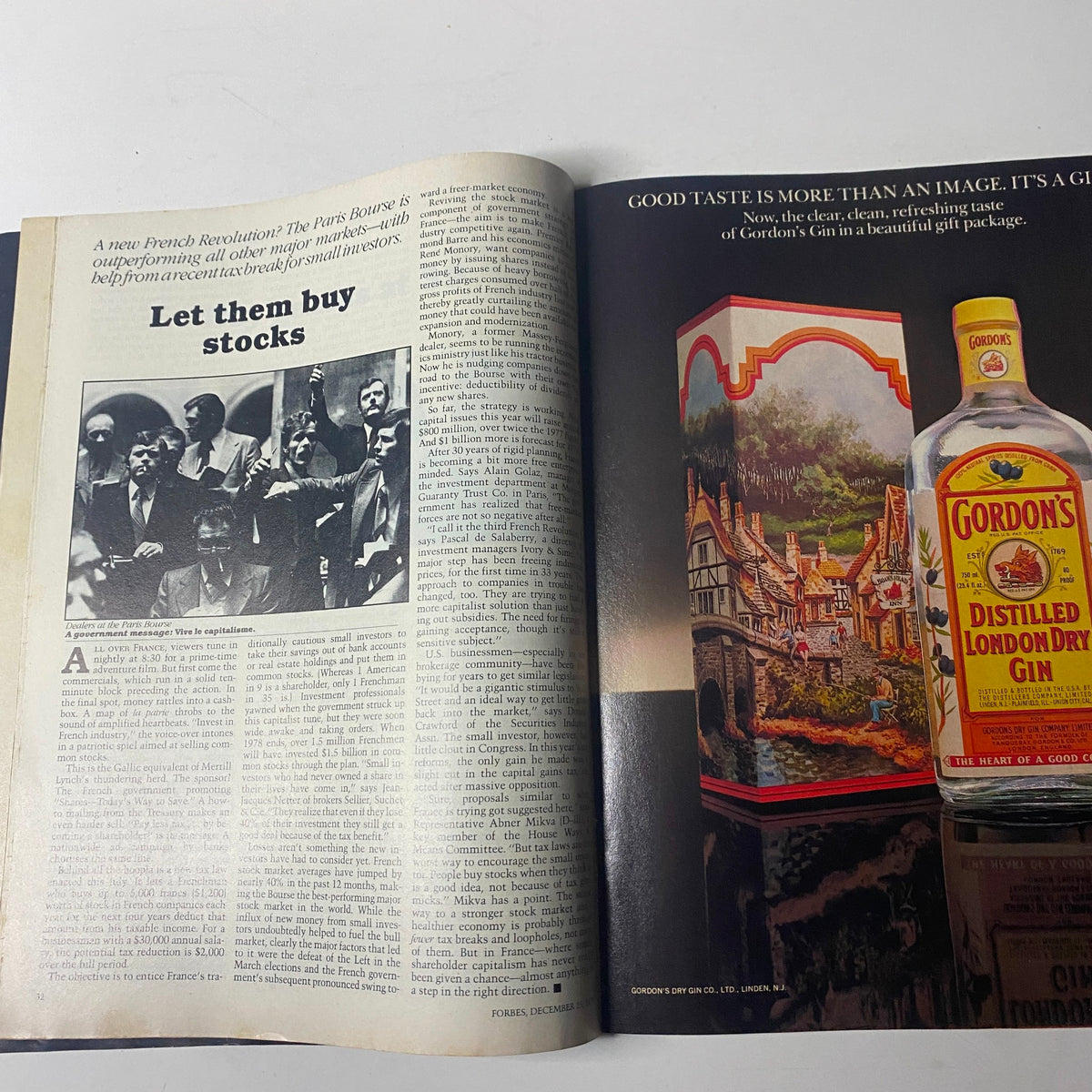Inside page of Forbes Magazine December 25, 1978 featuring an article titled 'Let them buy stocks' discussing French markets, alongside an advertisement for Gordon's Distilled London Dry Gin.