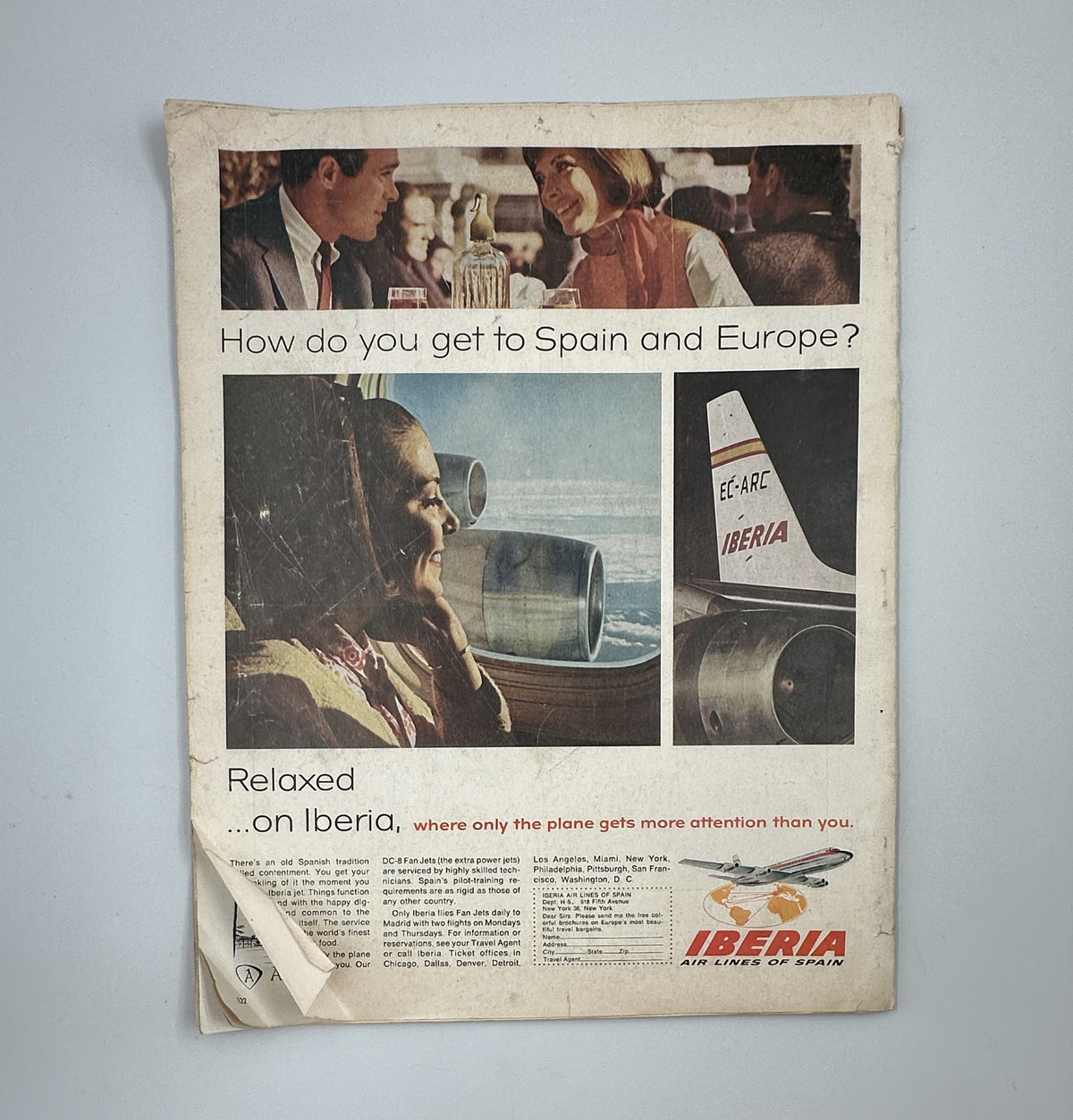 The back cover of Holiday Magazine January 1966, displaying an advertisement for Iberia Airlines, with visuals of a passenger airplane and promotional text about traveling to Spain and Europe.